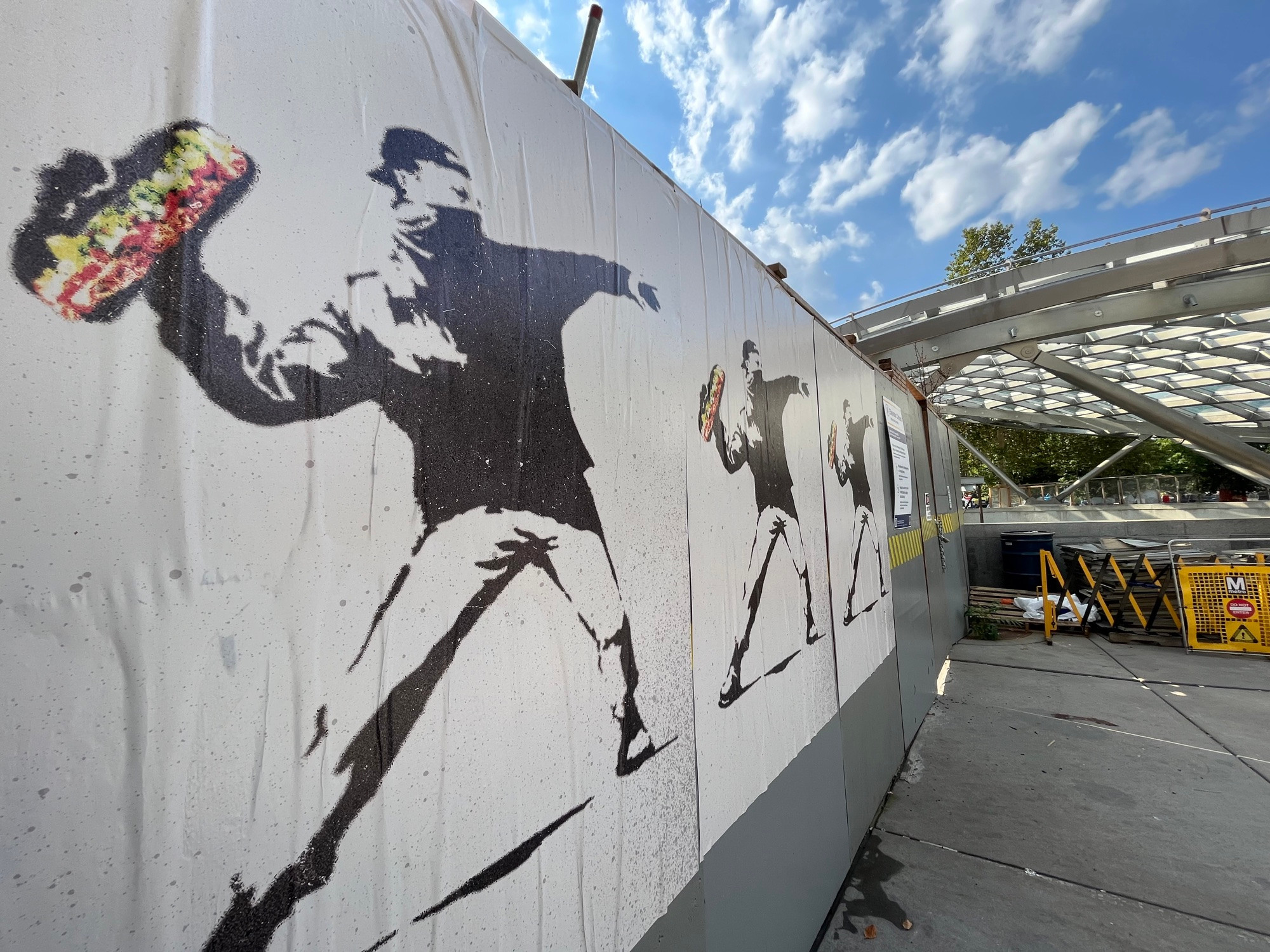 Sandwich man posters next to Dupont circle metro stop 