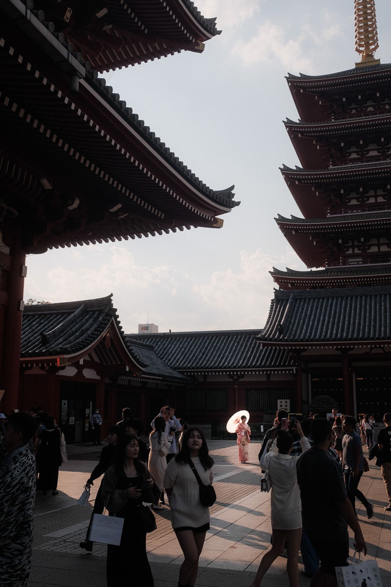 A woman with a parasol in Asakusa, Tokyo.