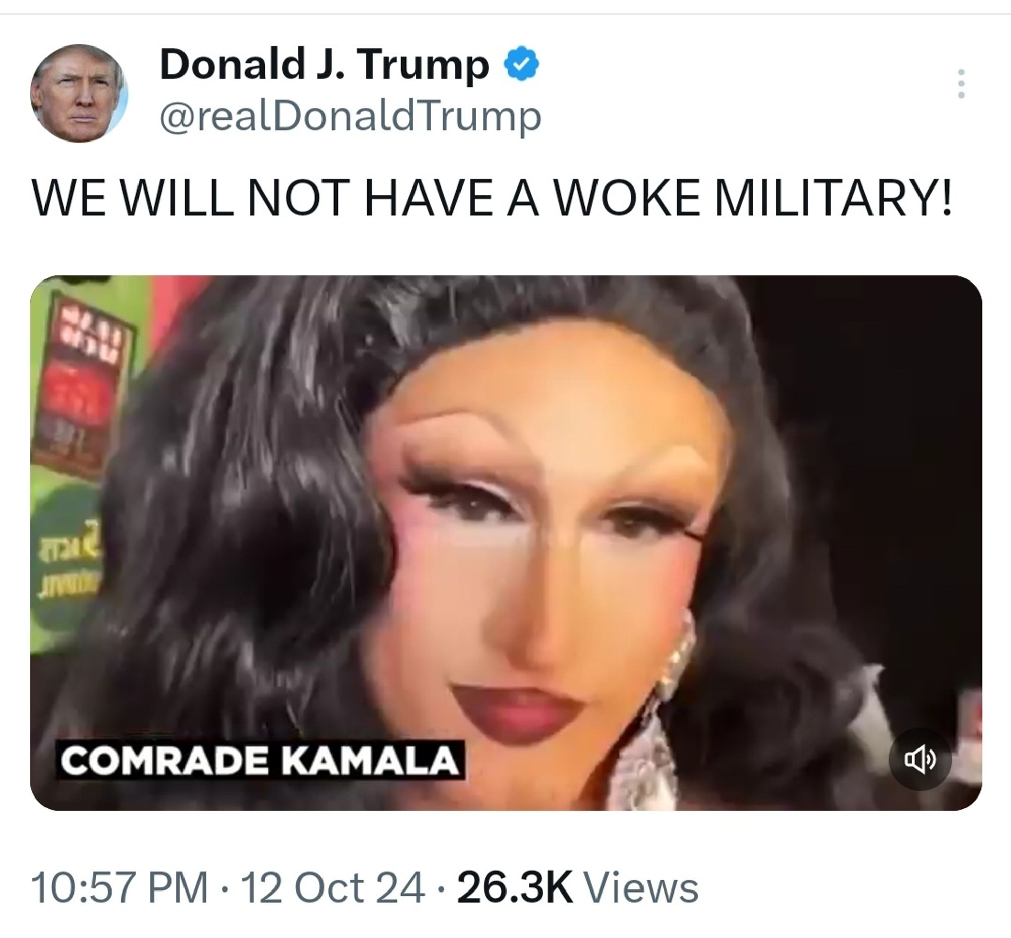 Trump says we will not have a woke military and a video of a drag queen plays 