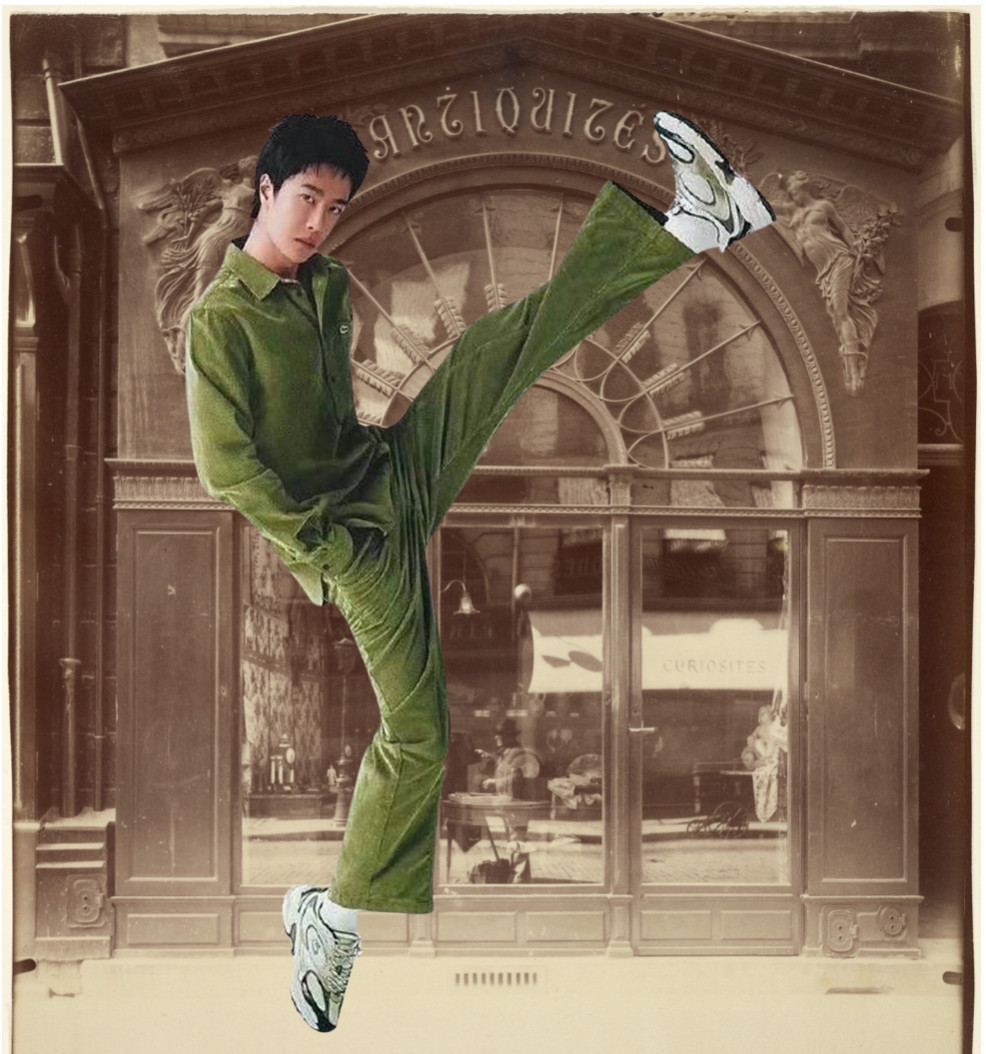 WYB in green athleisurewear, hands in pockets, enpointe on his right besneakered foot, while his left ensneakered foot kicks as high as his head. This image superimposed on a photograph of a Parisian antique store taken in 1902. The building now houses a Chanel boutique.