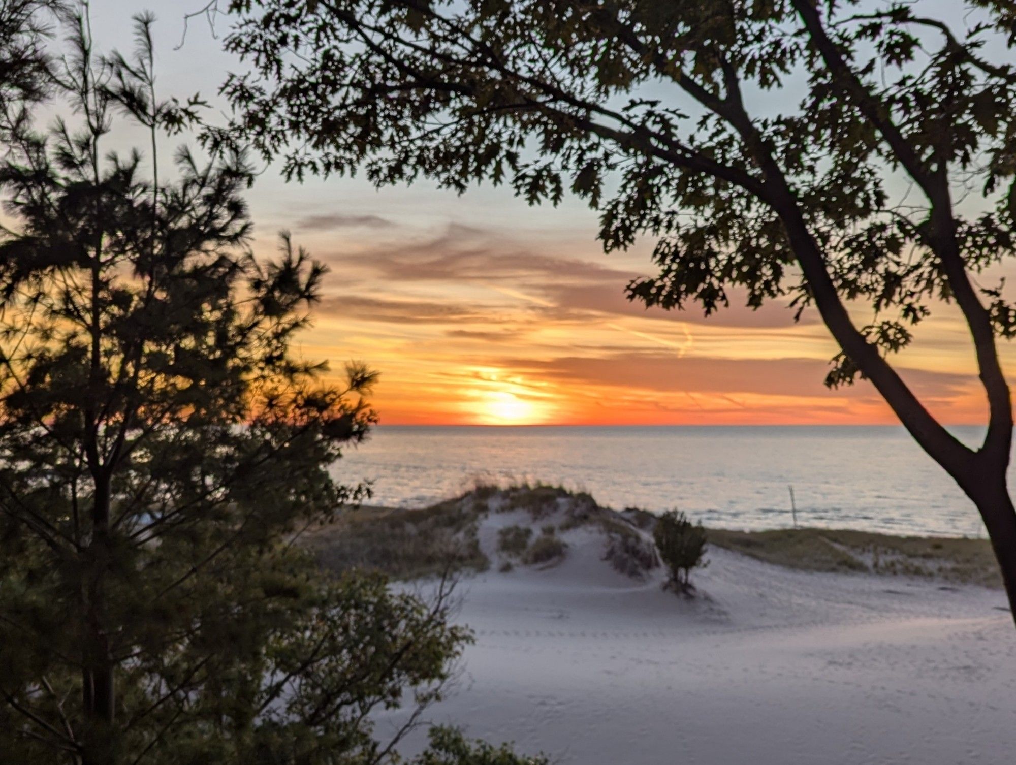 Sunset over the dunes and lake Michigan from Onekama MI