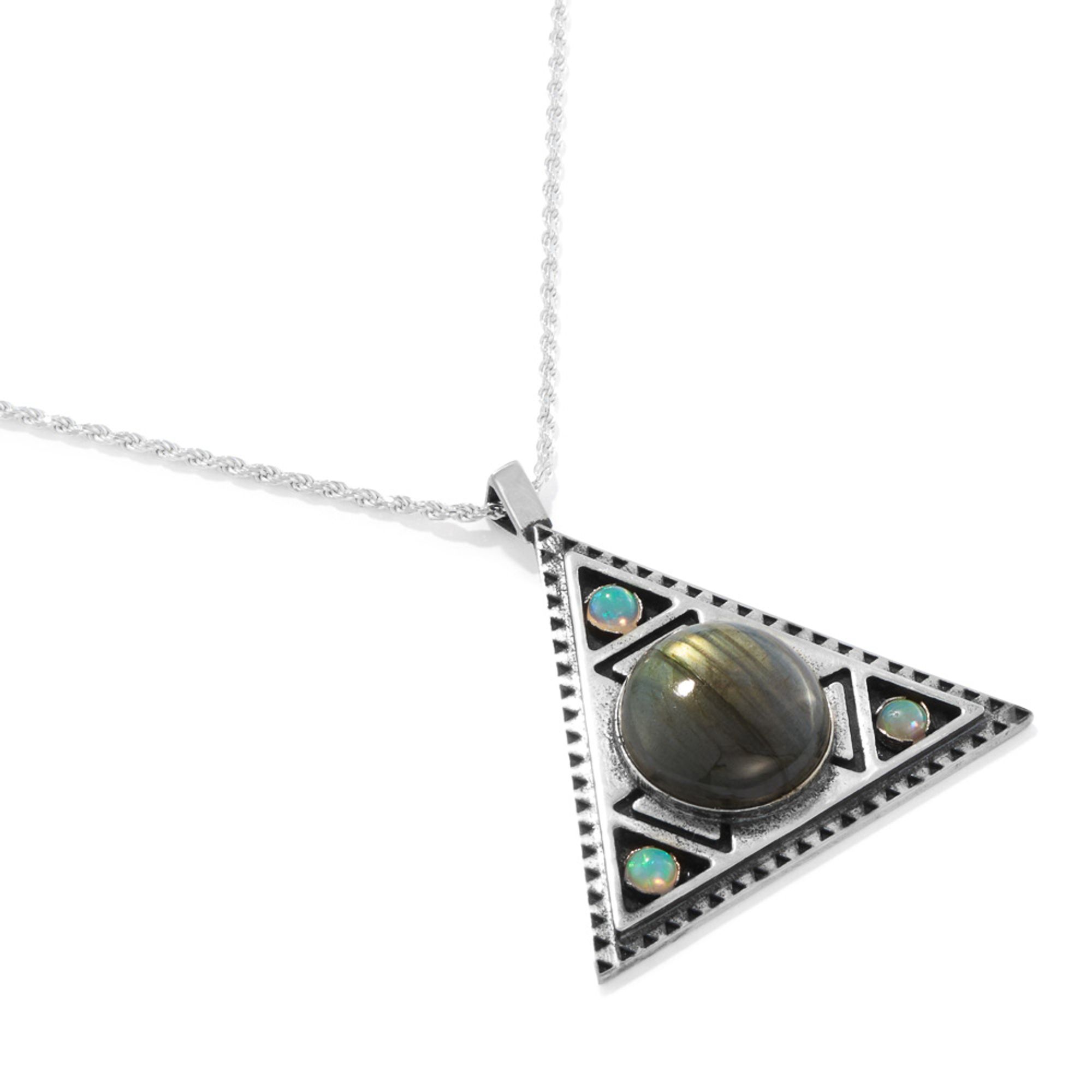 The Eye. This is a sterling silver necklace made of triangles. In the center is a 20mm labradorite gem, surrounded by 3 Ethiopian opals at each point of the triangle.