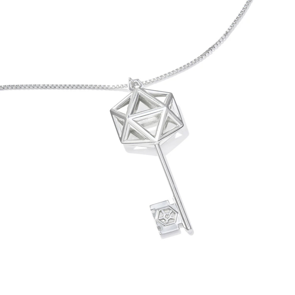 Out D20 Key Necklace design with a large icosahedron bow of the key, and a sort of cutout stencil of a D20 in the wards portion of the key. The bail is also a pentagon (which is the basis of an icosahedron)