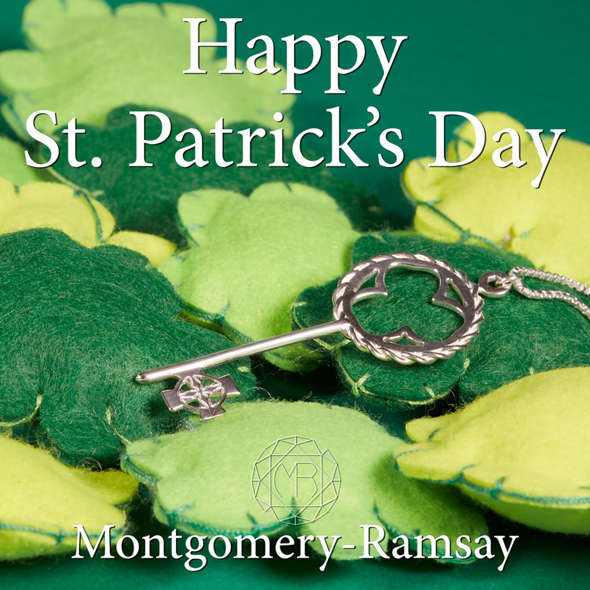 A picture of one of our jewellery pieces (Celtic Key necklace) on a bunch of green shamrock pillows with test that says "Happy St. Patrick's Day"  and the logo for Montgomery-Ramsay.