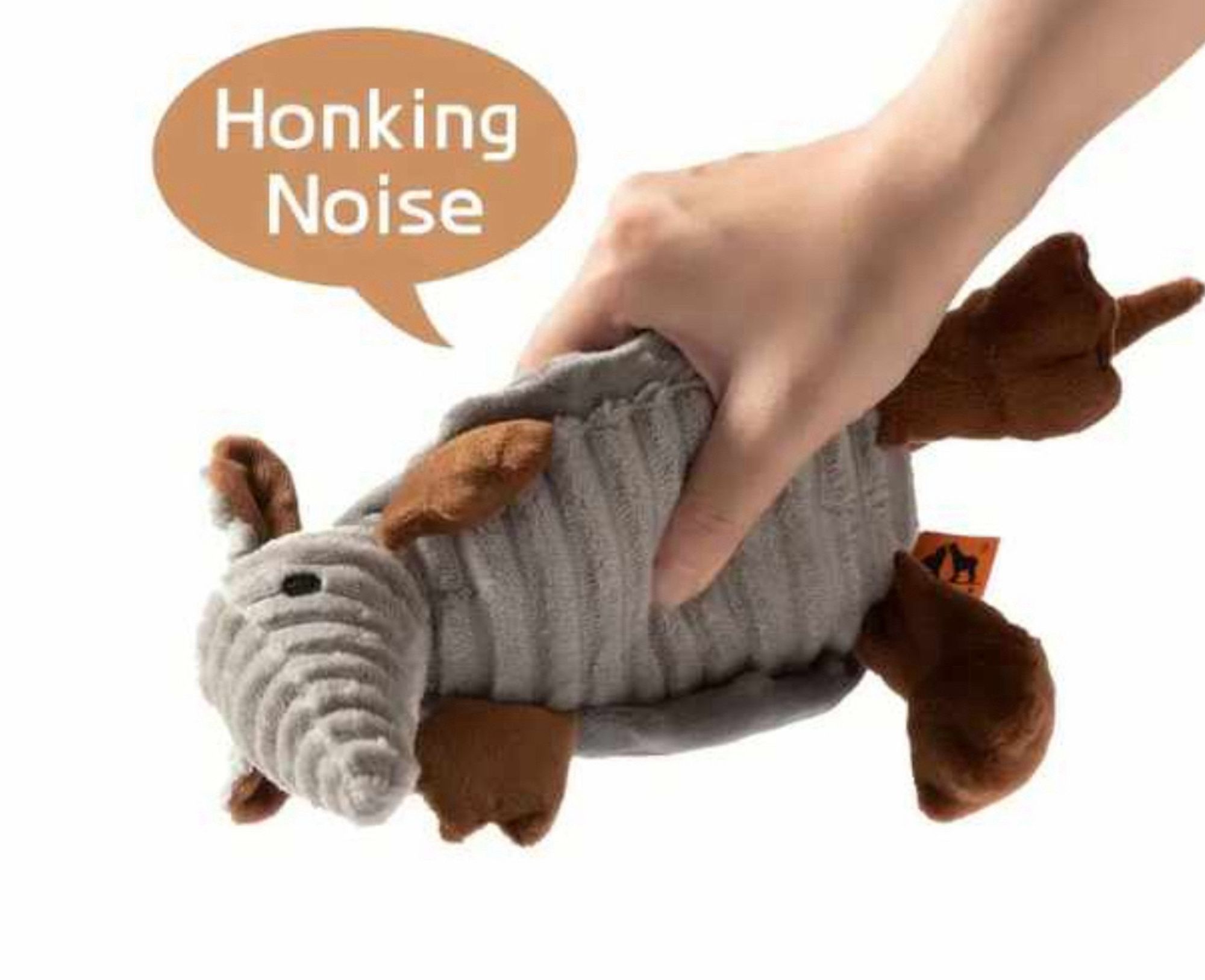 An armadillo toy for dogs. It is saying “honking noise”.