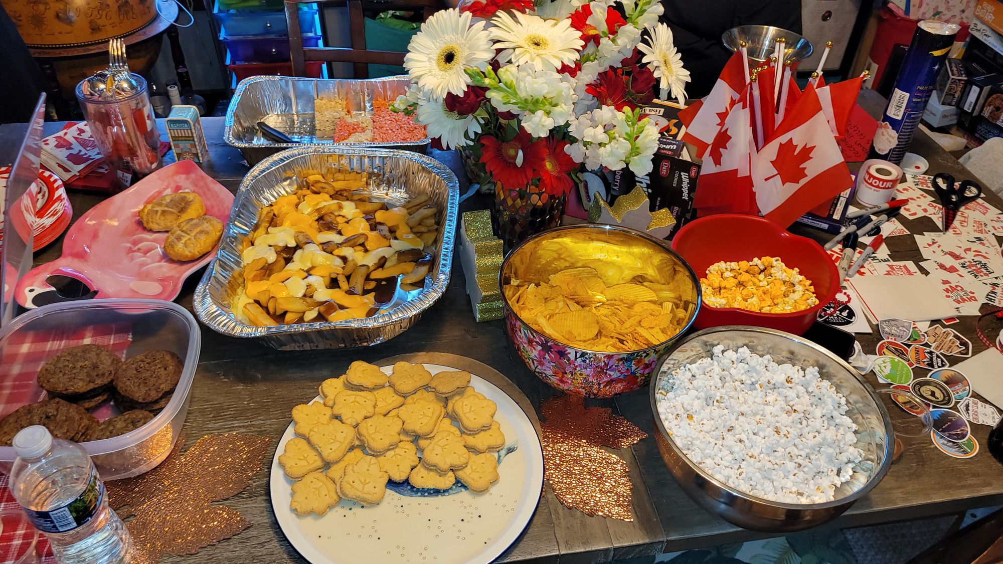 The spread.  Lots of things made with maple syrup, rice crispie treats dyed to look like the Canadian flag, and of course, POUTINE.