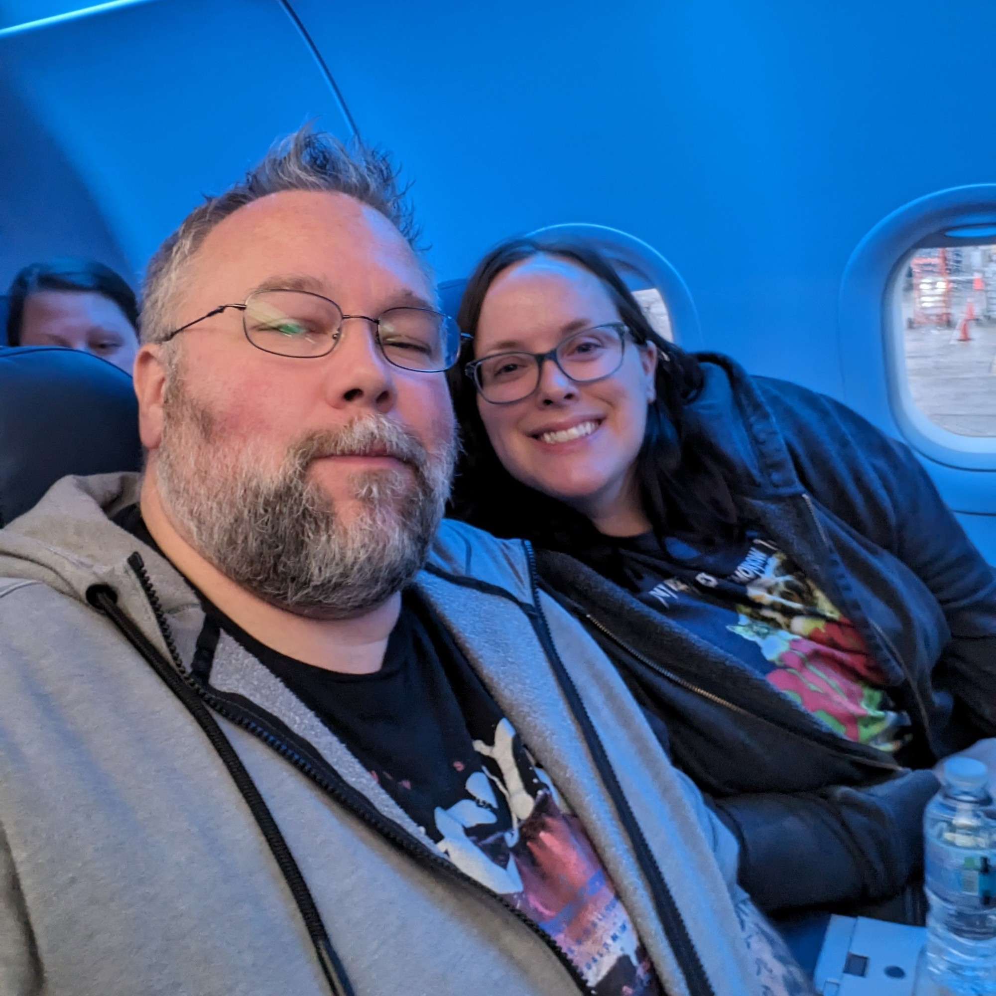 Ger and I in our seats on the airplane