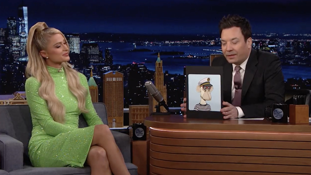 Jimmy Fallon shows his NFT to Paris Hilton.
