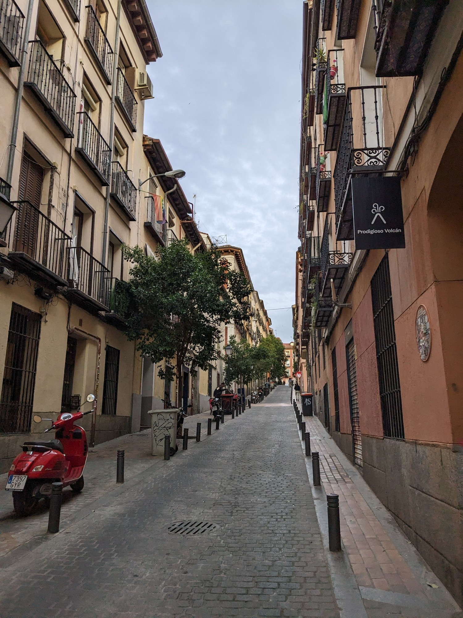 A street in Madrid. It has that cosy, fun, warm European city vibe.