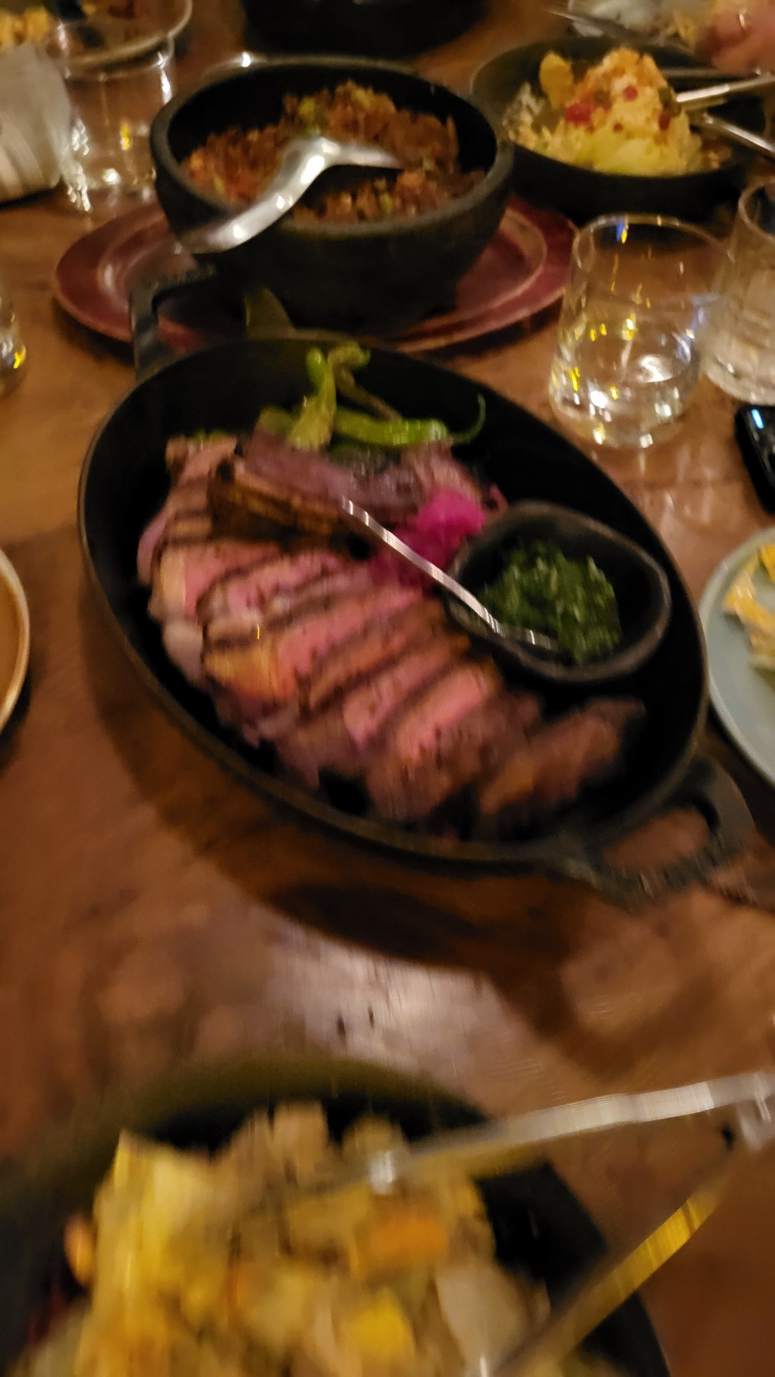 Blurry picture of a big ass cut up steak