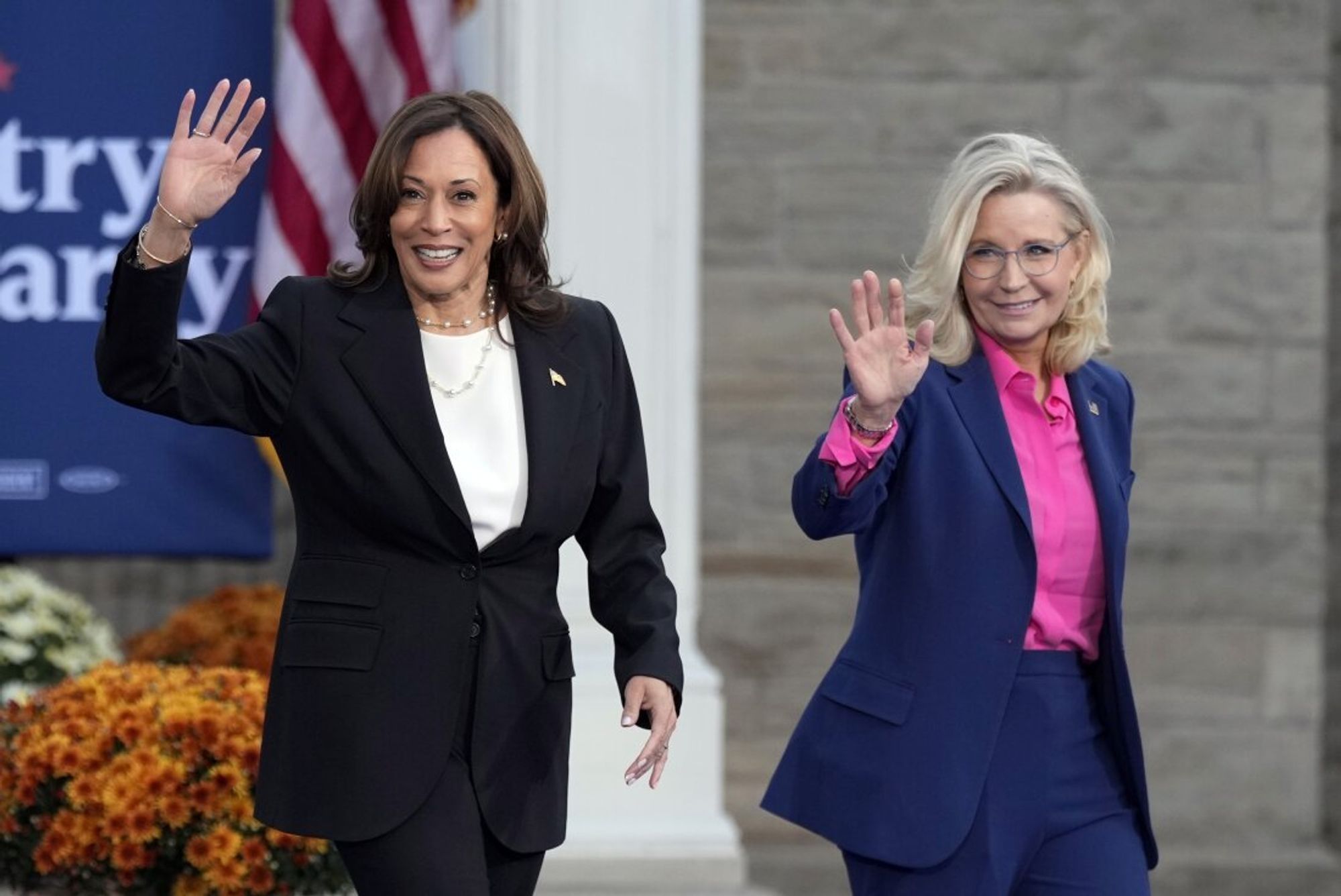 Kamala Harris and Liz Cheney walking onstage together in WI.