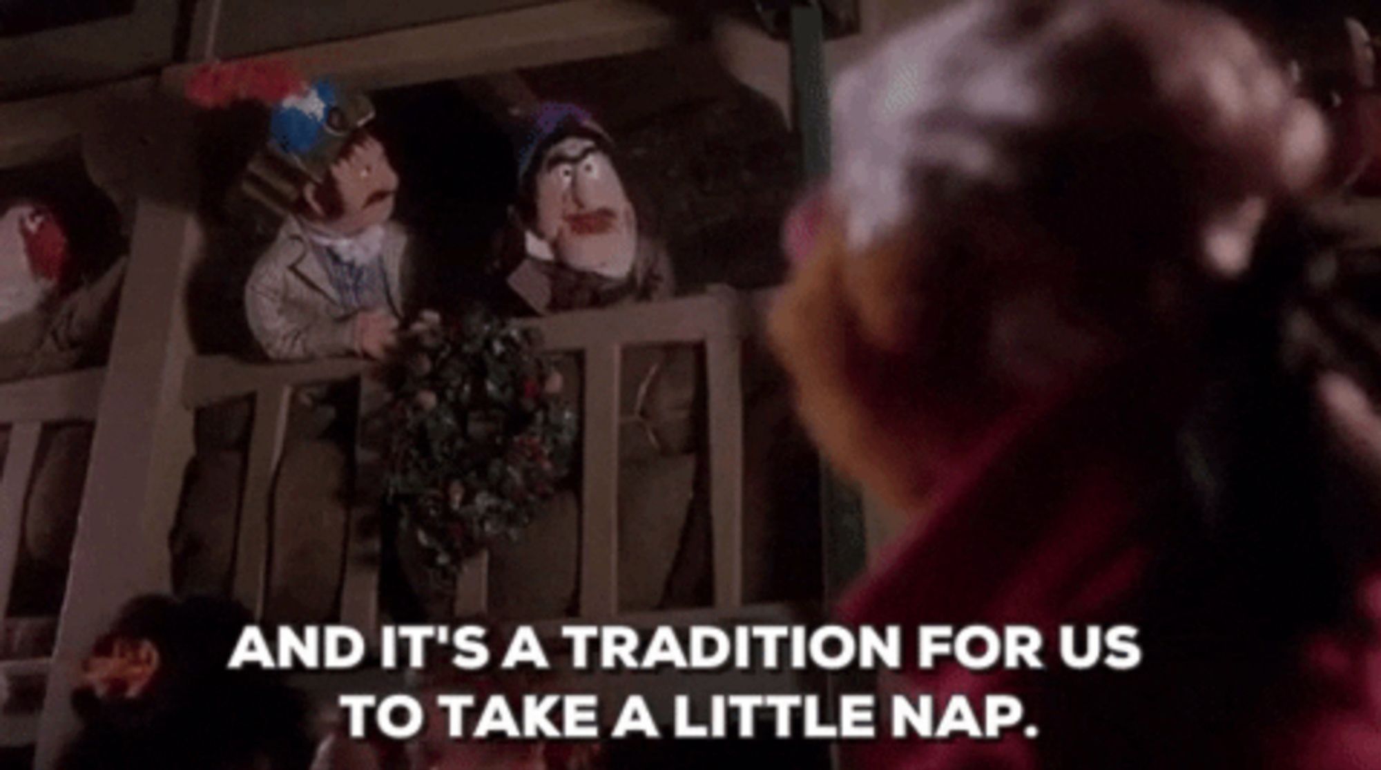 Scene from A Muppet Christmas Carol when Fozziewig is saying "it's a tradition for me to give a little speech" and Statler & Waldorf interrupt to say "and it's a tradition for us to take a little nap."