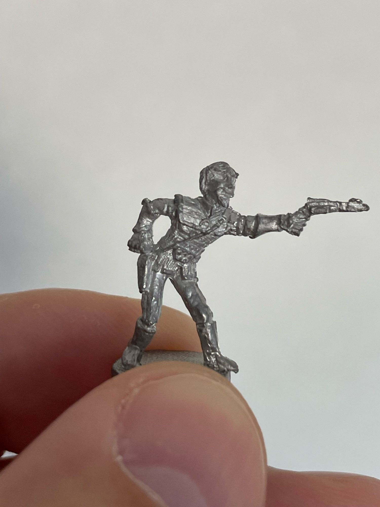 Extremely oddly posed Klingon lead miniature.