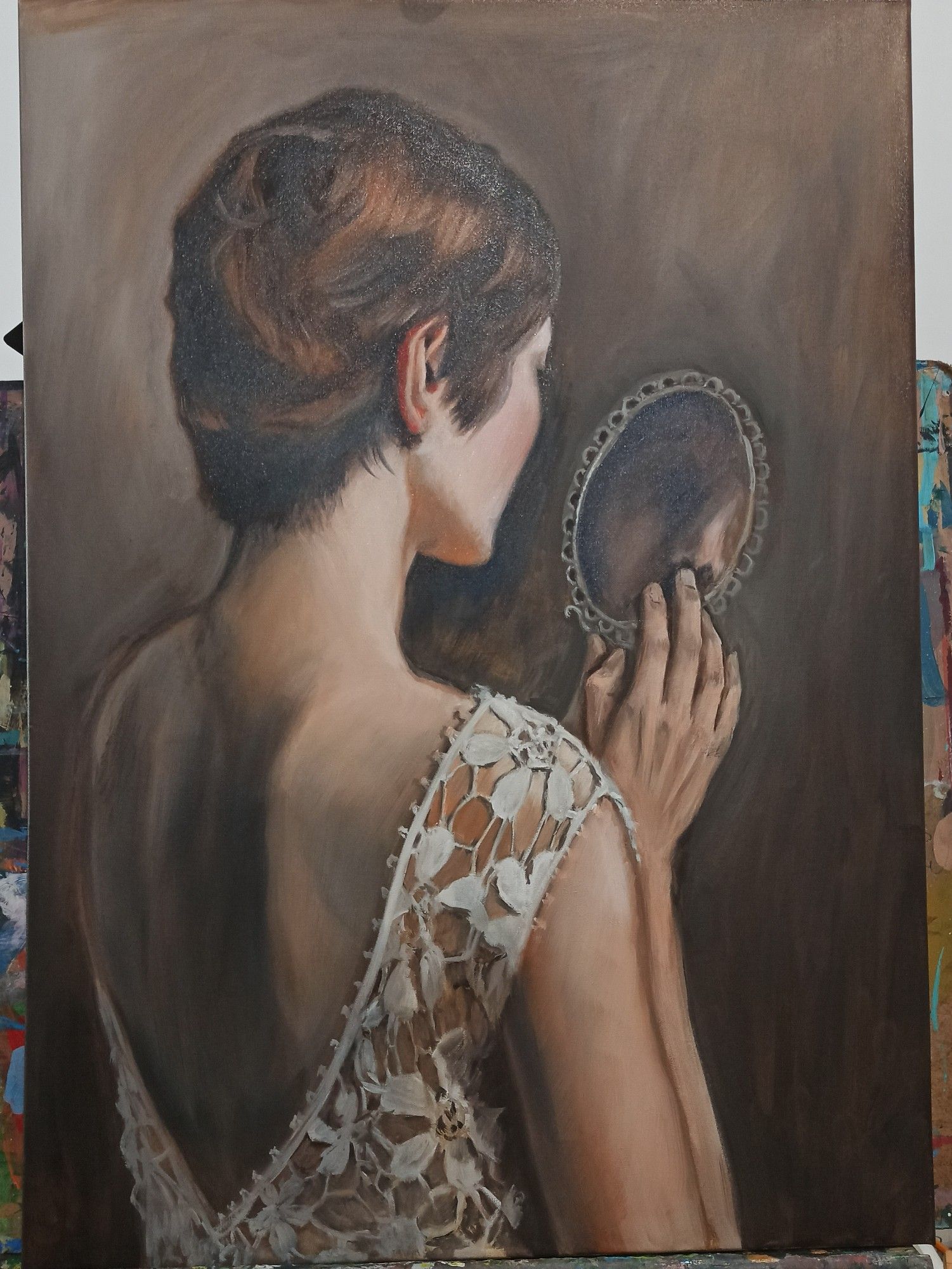 Oil painting of a woman looking into the hand mirror.