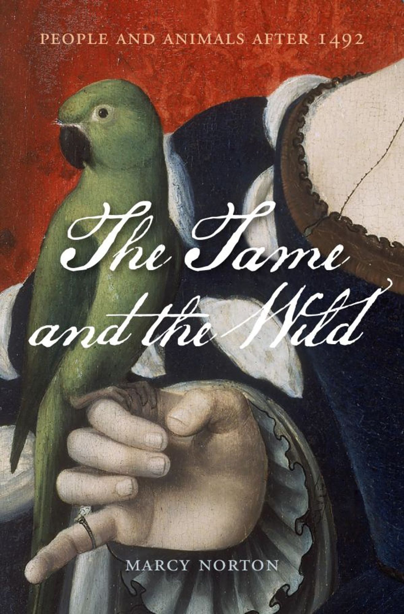 The image is from the book cover of The Tame and the Wild. It has the title of the book and an image of a parrot seated on the hand of a person.