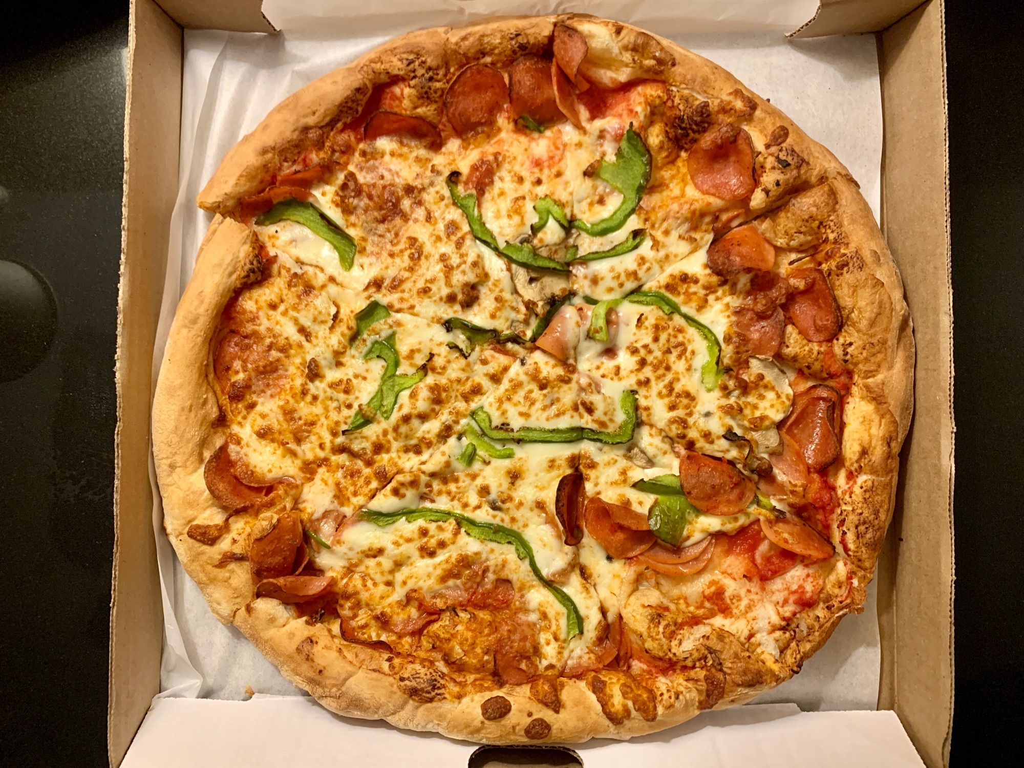 Medium Combo Pizza (green peppers, pepperoni and cheese) from Napoli Pizzeria in Sydney.