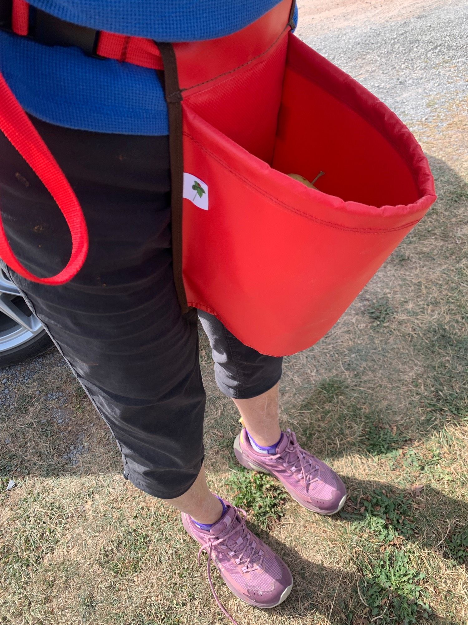 The nicest woman from Newfoundland wearing her Crackerberry Bag filled with some apples.