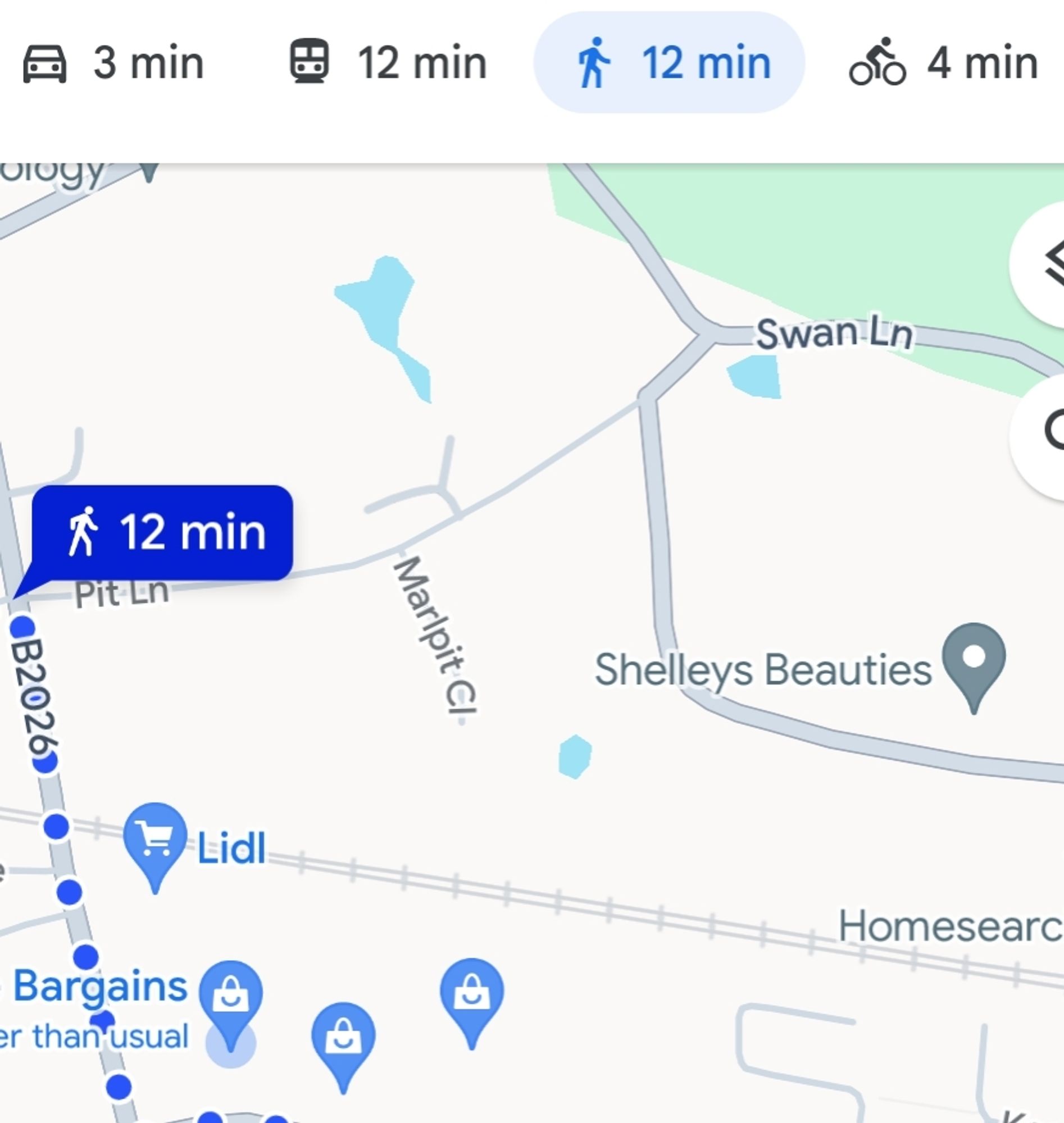 The distance from my house to the train station. Car is 3 mins, cycling is 4 mins and walking is 12 mins.