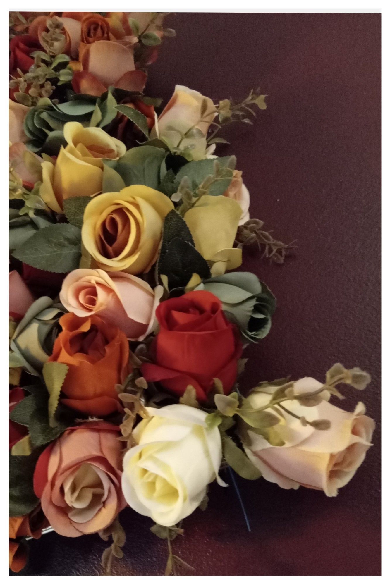 Roses displayed on a wall