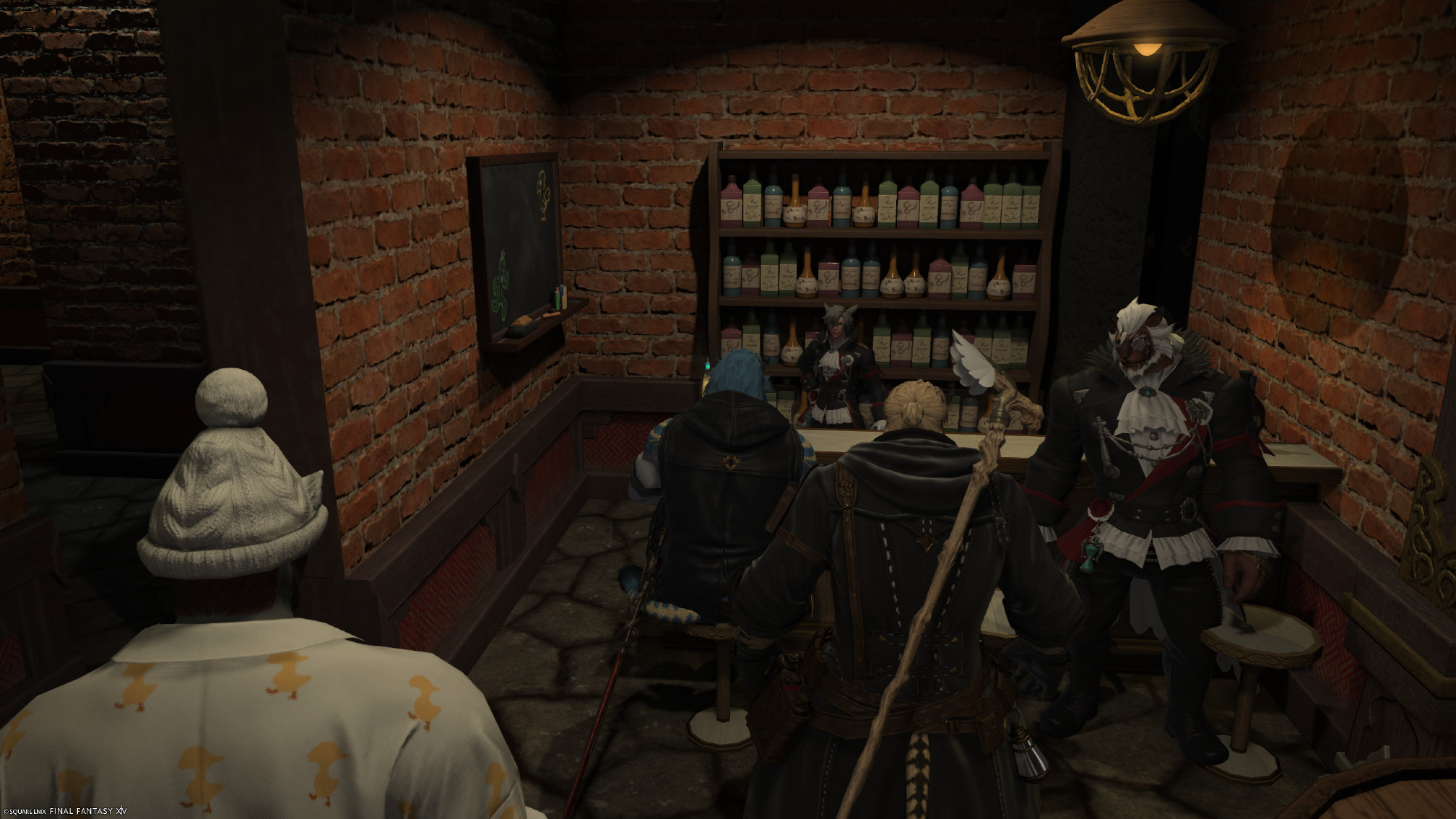 Group of people enjoying the bar within the haunted house.