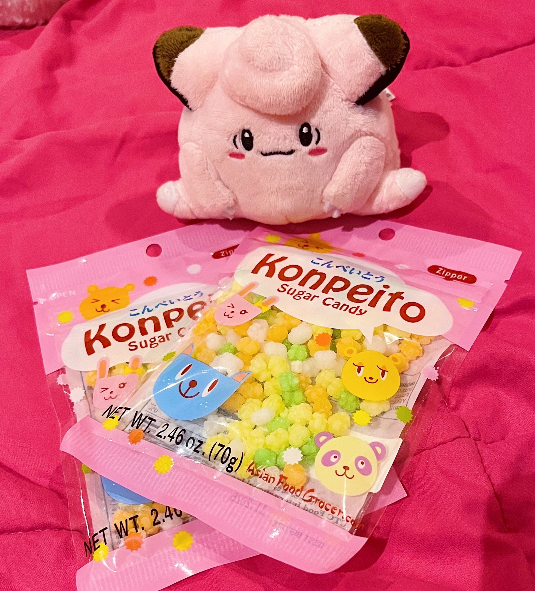 sitting clefairy sitting on konpeito(sugar candy)