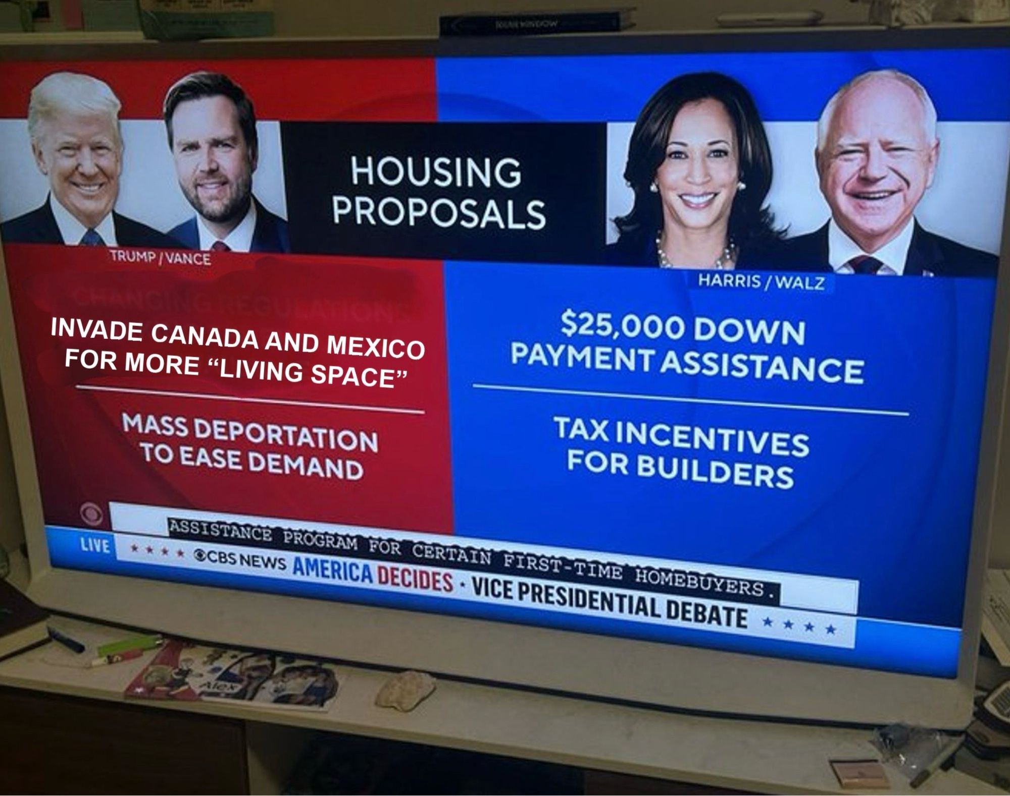 Faked screen of the parties’ housing proposals. 
Trump/Vance is 
- INVADE CANADA AND MEXICO FOR MORE "LIVING SPACE" (this is the fake point)
- MASS DEPORTATION TO EASE DEMAND
 
HARRIS/ WALZ is
- $25,000 DOWN PAYMENT ASSISTANCE
- TAX INCENTIVES FOR BUILDERS