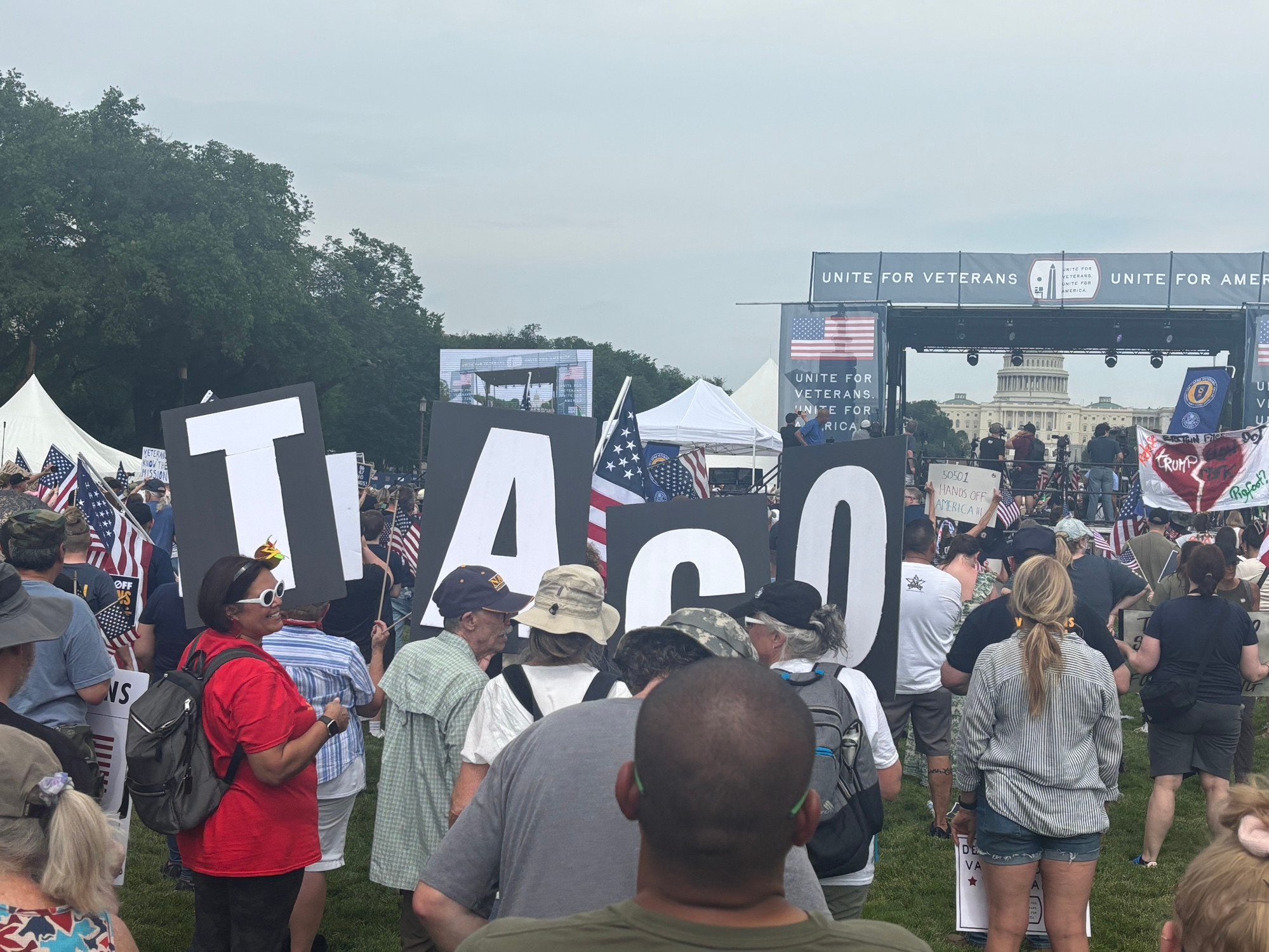 Signs. Large single letter signs that spell taco