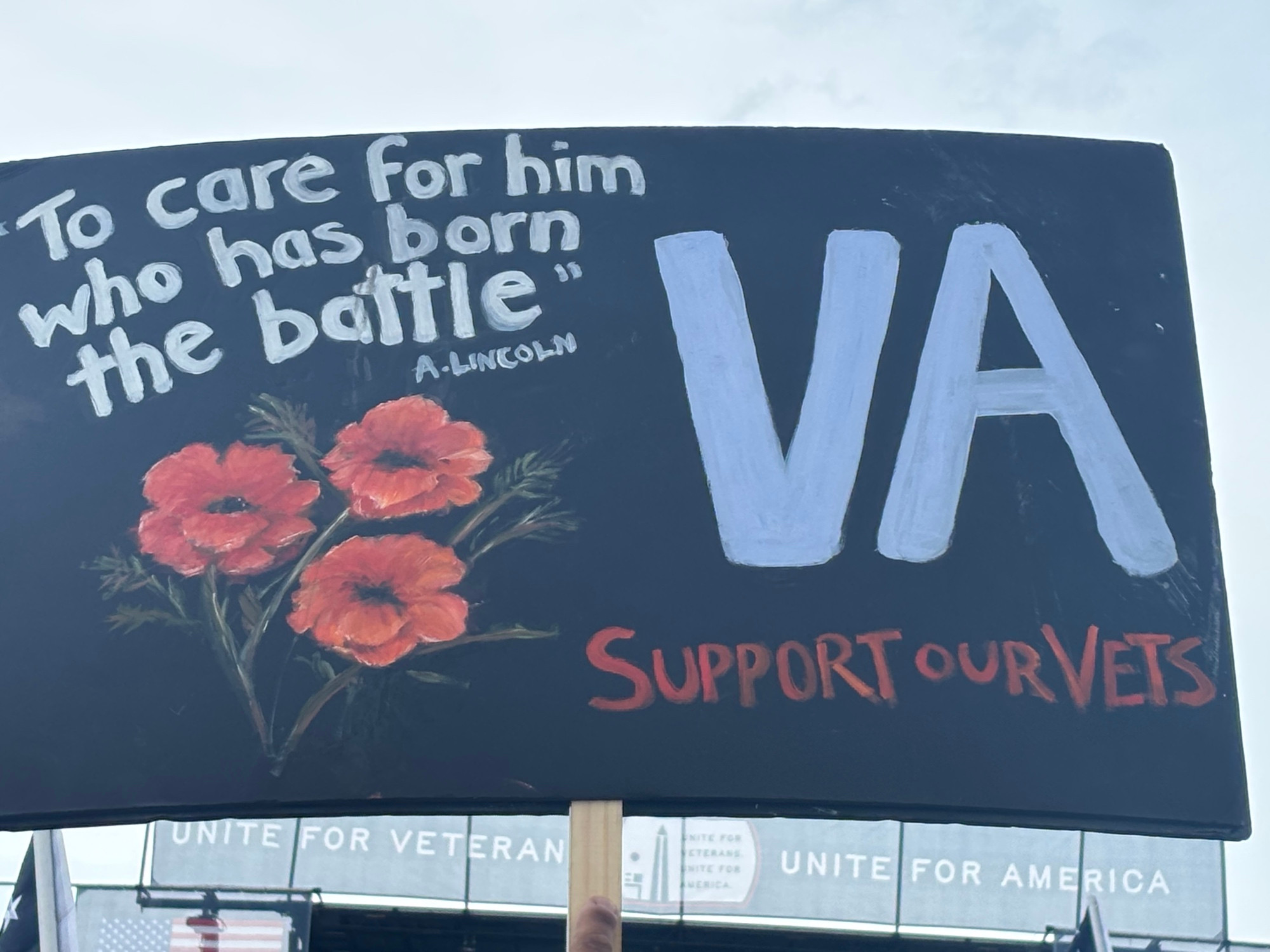 Sign that says to care for him who has born the battle. Quote from Abraham Lincoln. VA support our vets