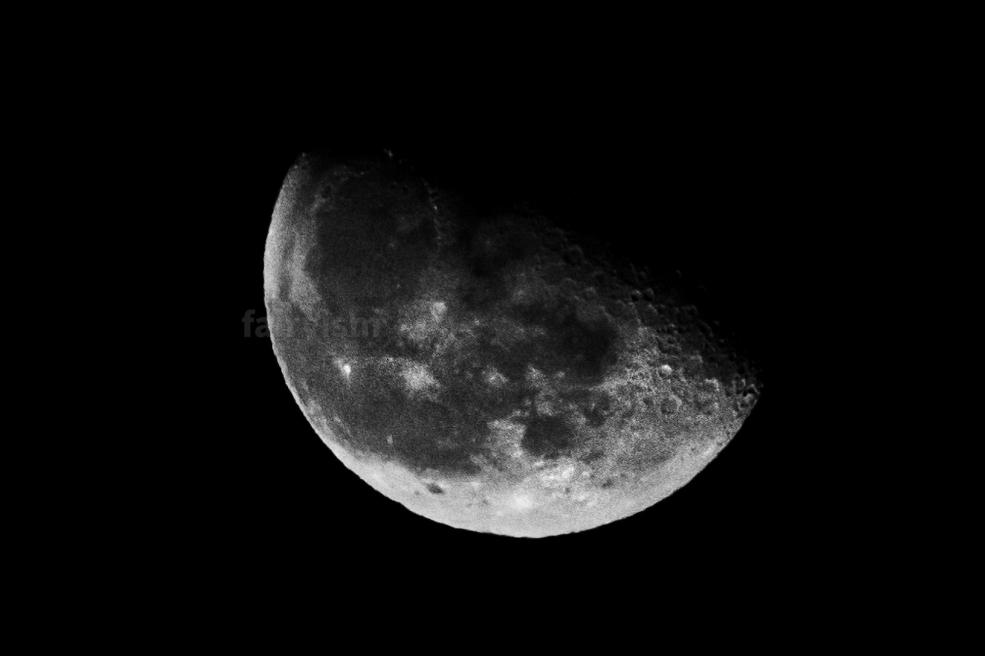 Black and white capture of the half moon.