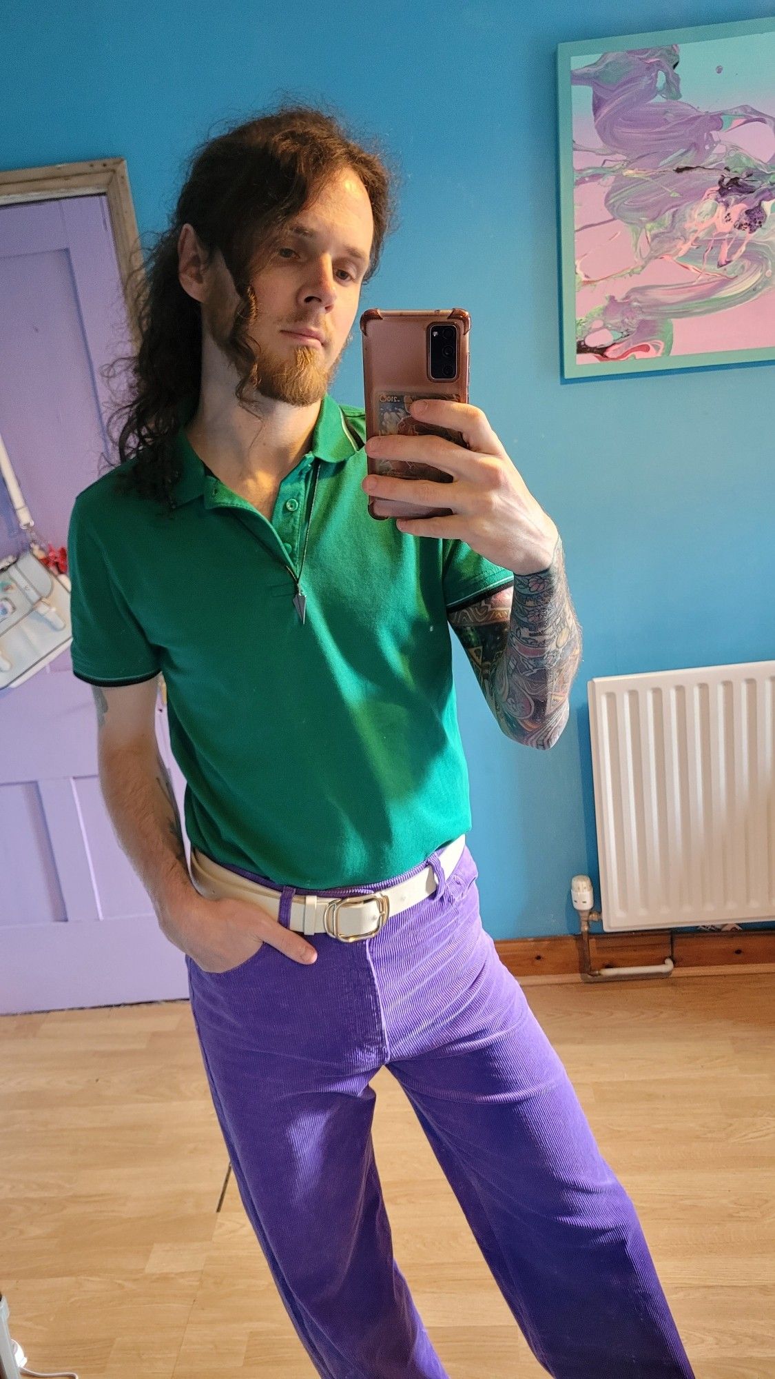 Me in a green polo with purple trousers.