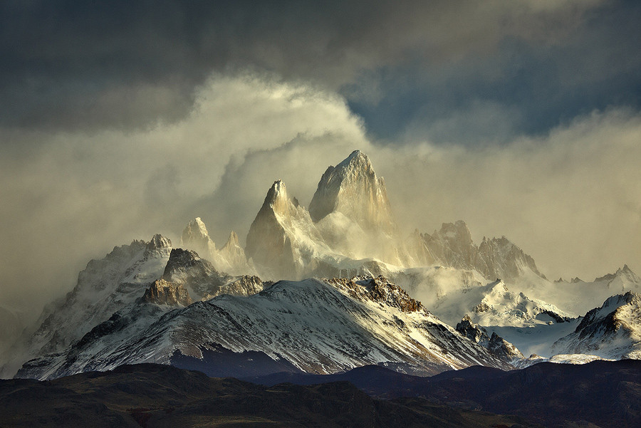 Glorious Mount Fitz Roy emerges from the clouds, as strong winds put an end to a cloudy morning. Patagonia is challenging to photograph, the mountains can be hidden for days, but when they clear, the beauty is unmatched!