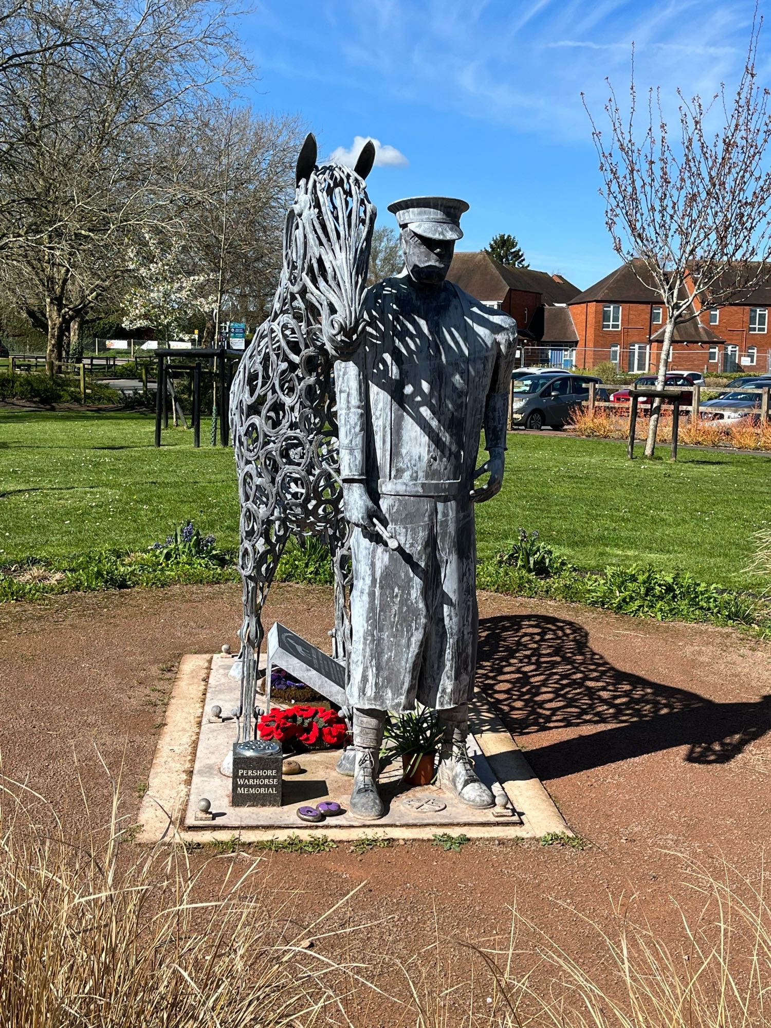 War memorial with horse made of horseshoes