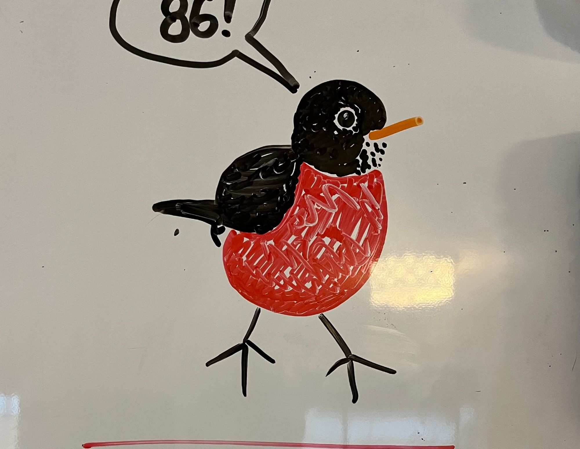 a dry-erase-marker drawing of a fat little robin. a text balloon has the bird saying (chirping?) "86!" because he is heading up a household grocery list (not shown)