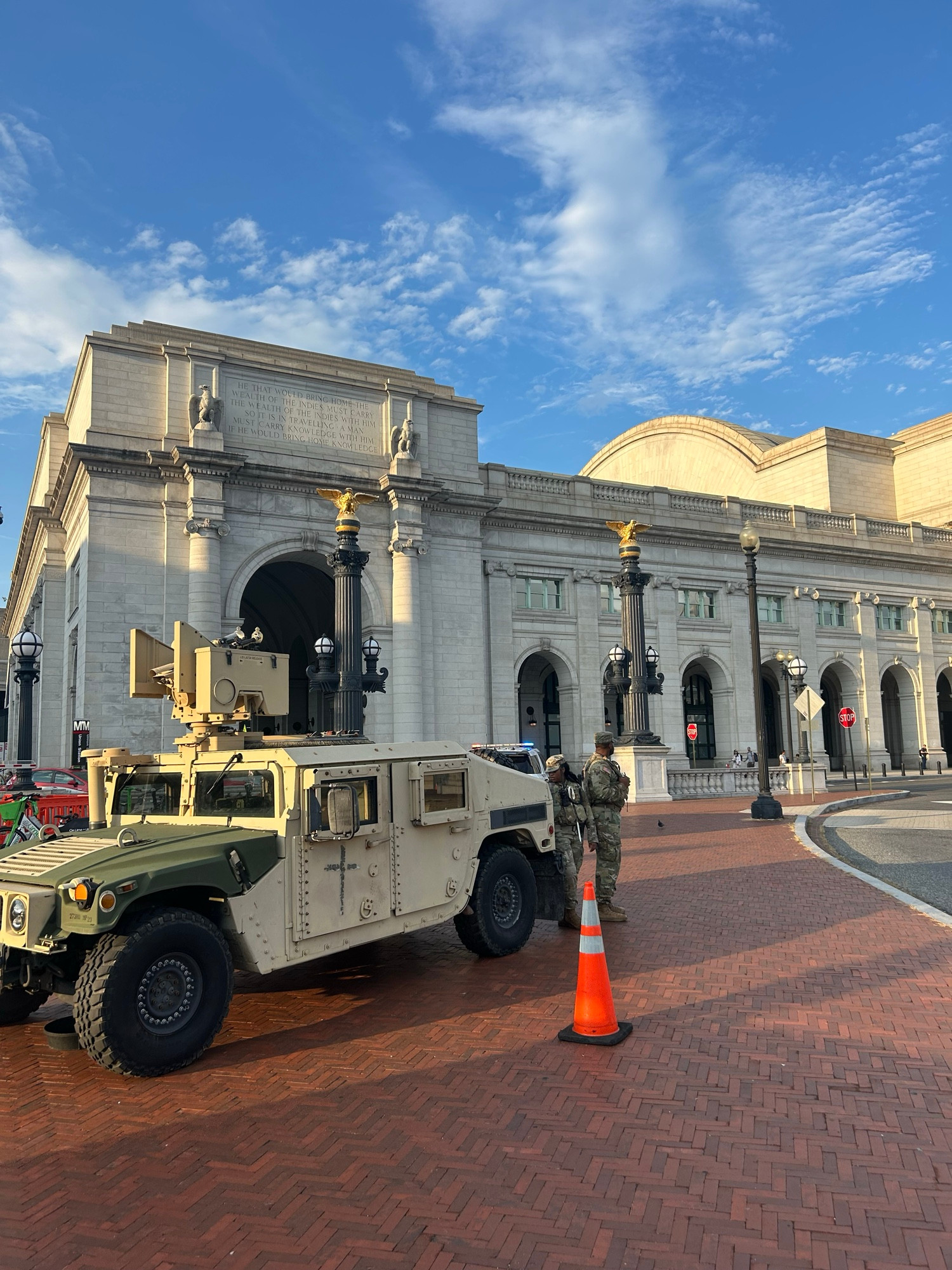 A photo of a truck outside of the train station 