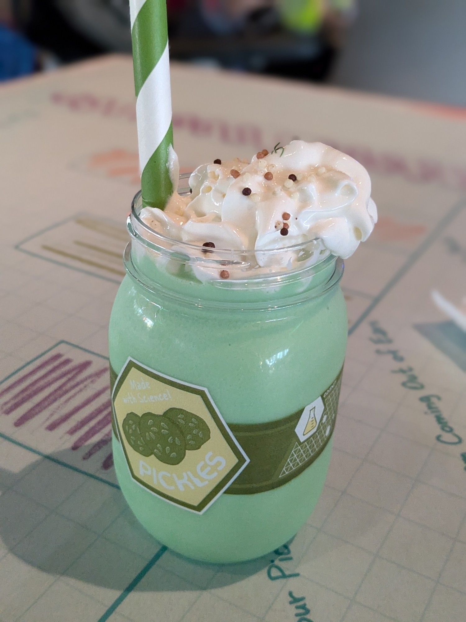 Pickle milkshake with whipped cream at Muppets Brew-Wing Lab (Walt Disney World, Epcot).