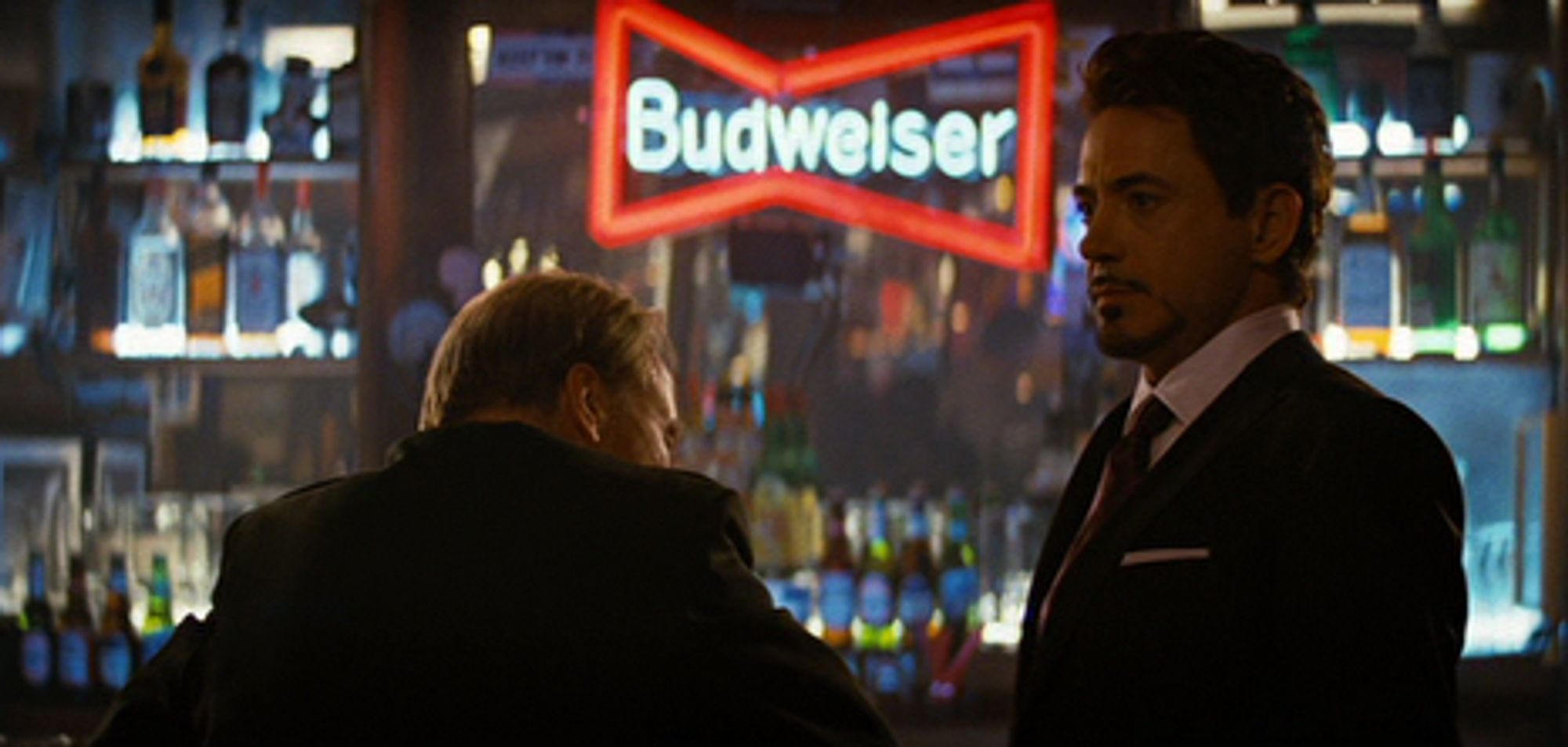 Tony Stark's cameo in the post-credits scene from 2003's "HULK". His skin looks very wet and moisturized. There's an obnoxiously bright sign in the background that says "Budweiser" -- they're in a bar, I just noticed.