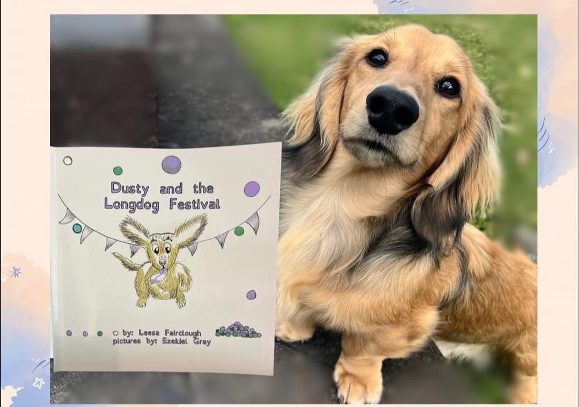 Dusty the dachshund poses next to his first picturebook!