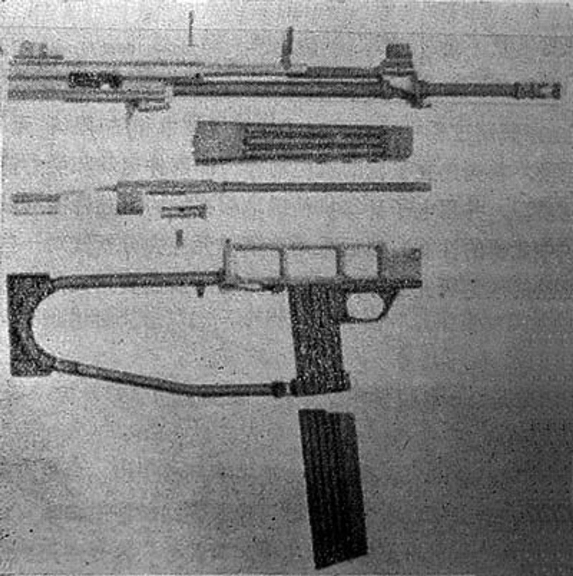 Disassembled you can see the real genius of the gun is essentially mixing AR and AK systems. The rotating bolt piston gas system and piston are all AK staples, as is the handling interface, while the chambering, magazine, and muzzle device are all AR.

Image Source: Guns and Ammo, December 1981