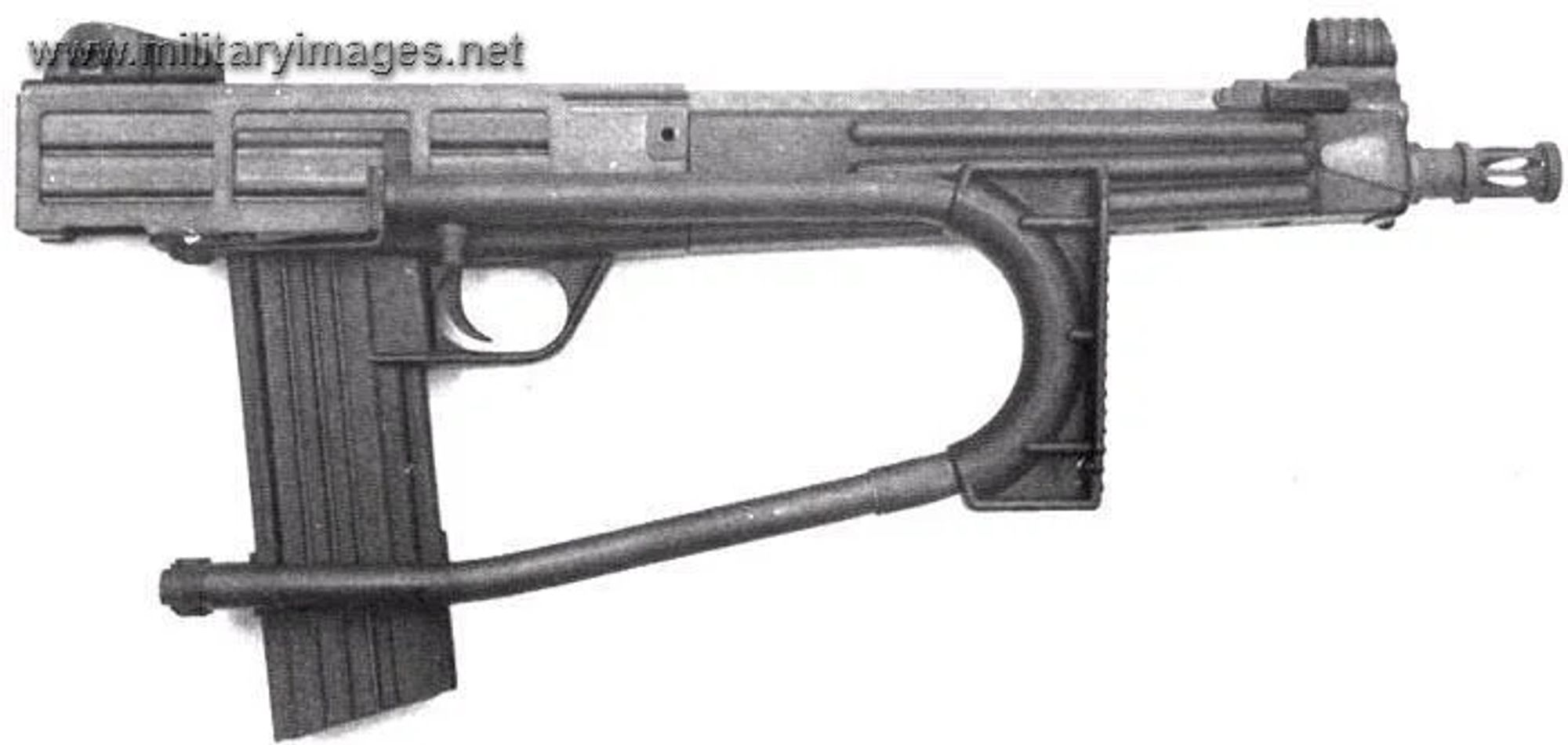 The carbine variant with a shorter 14 inch barrel and the stock folded.

Image source: militaryimages.net