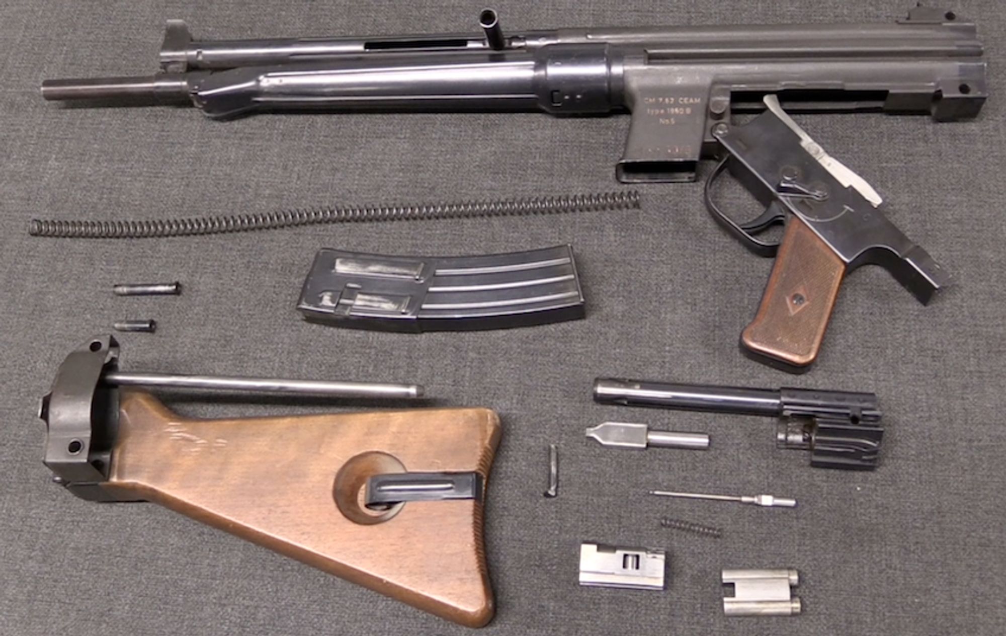 The gun disassembles to similar pieces as a G3.