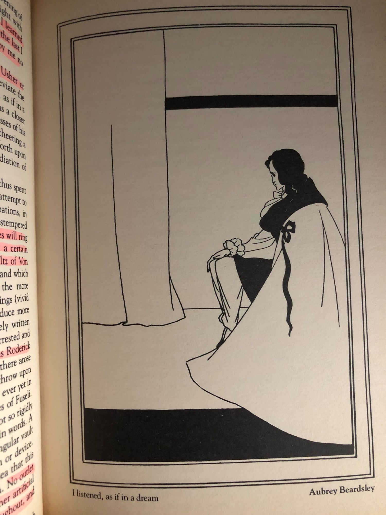 Photo of Aubrey Beardsley's black and white illustration for Edgar Allan Poe's "The Fall of the House of Usher." A man, wearing a long cape, is sitting down by the curtain. The caption reads "I listened, as if in a dream."