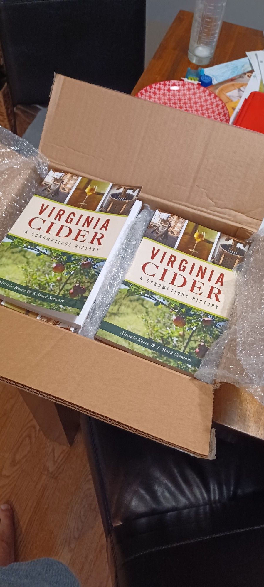 Box containing print copies of Virginia Cider by Alistair Reece.