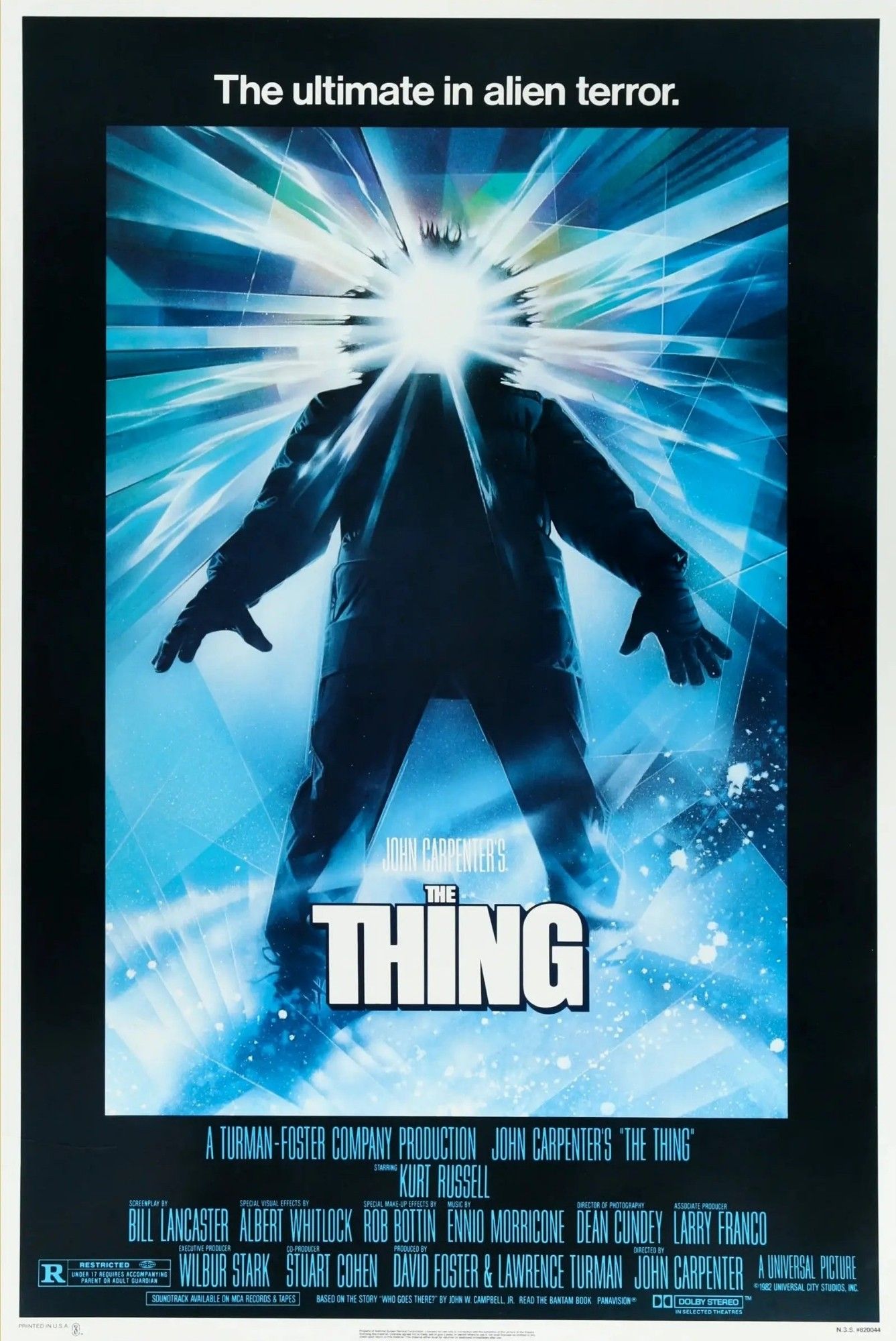 Film poster for The Thing. A silhouetted figure standing in a snowy/icy landscape has radiating beams of light instead of a face. The tagline on the poster reads "The ultimate in alien terror."