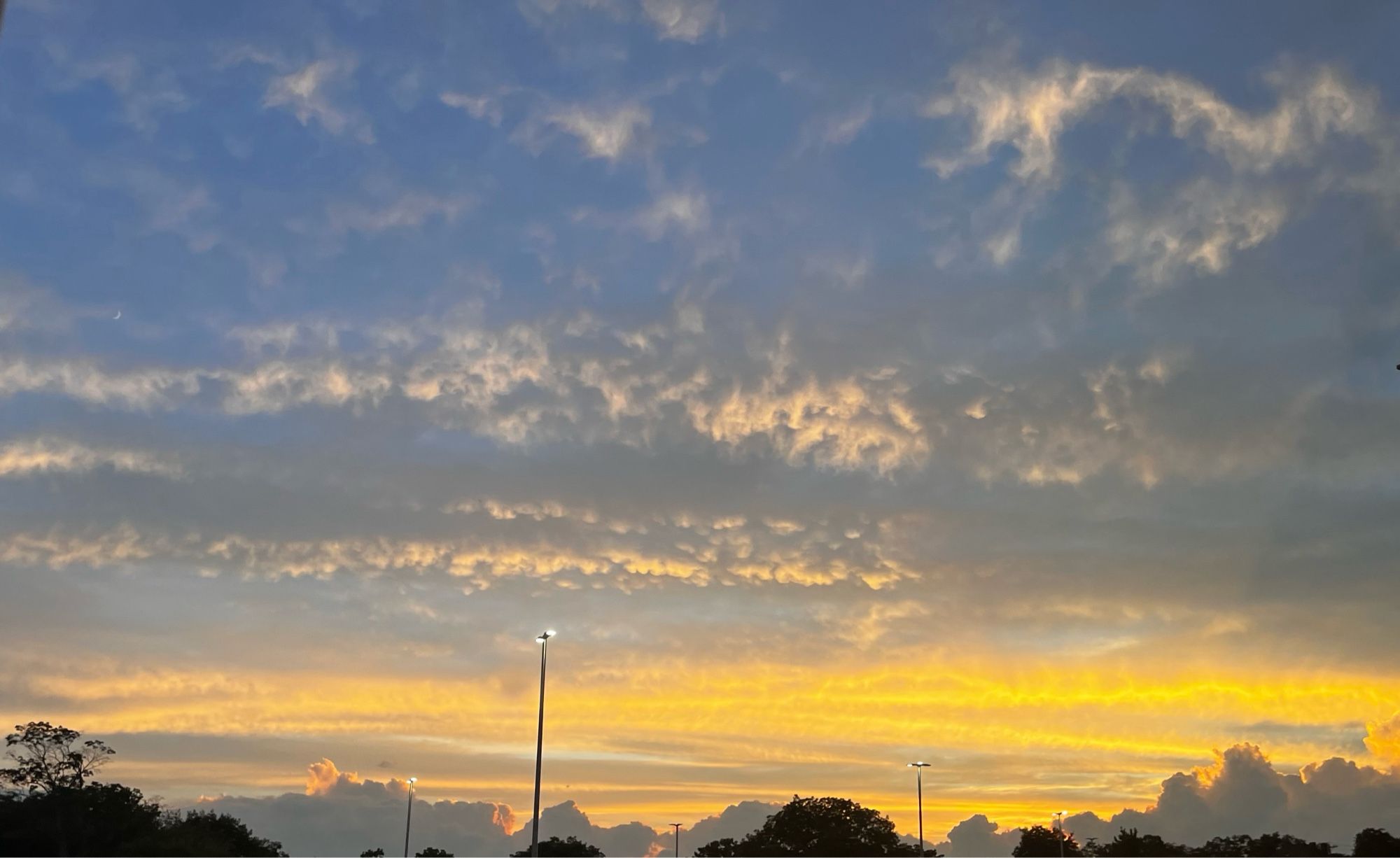 Photo of a blue, yellow, and grey sunset