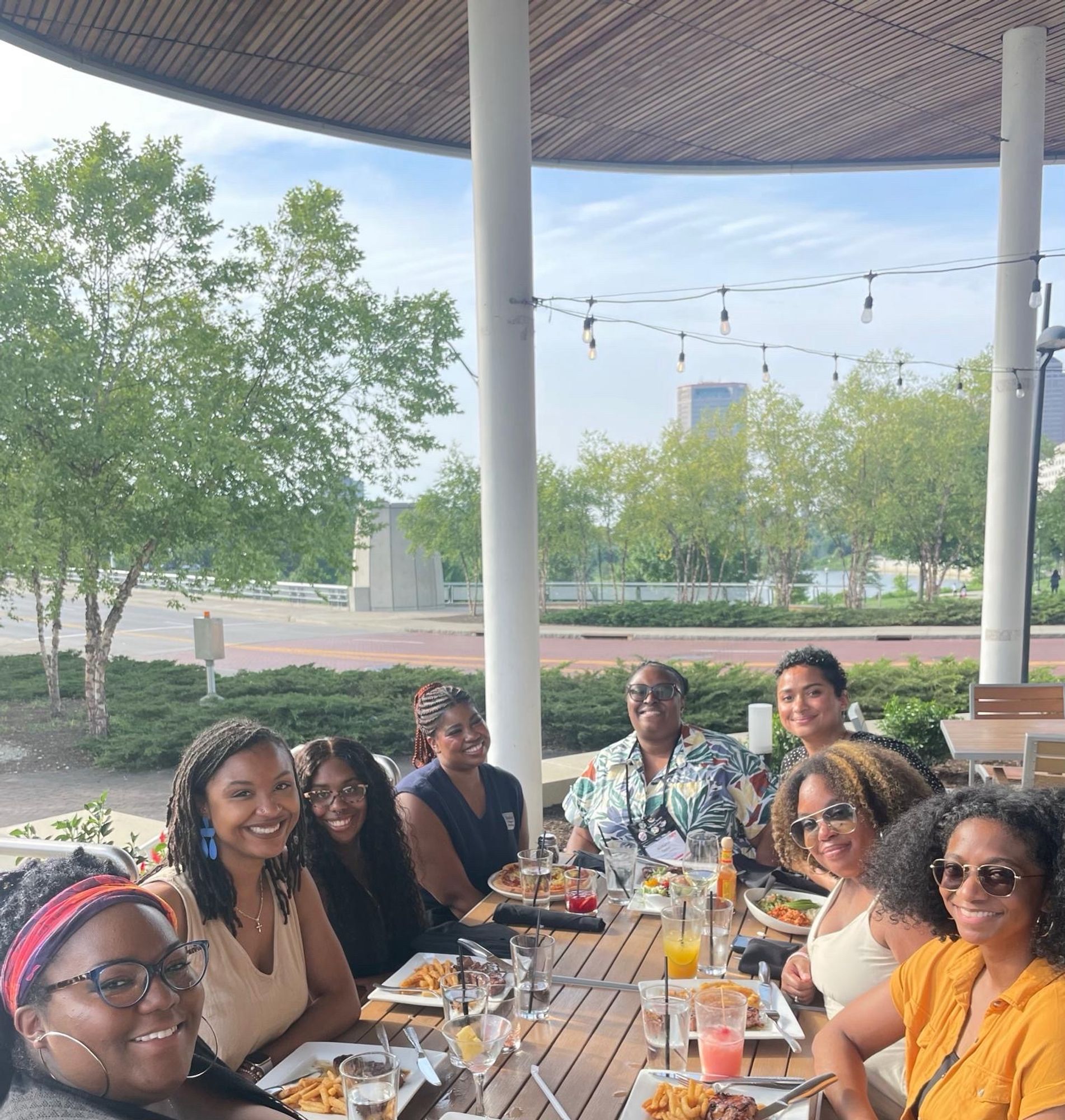 Group of 8 BMA organizers meeting for dinner outside in Columbus, Ohio during ASV 2024