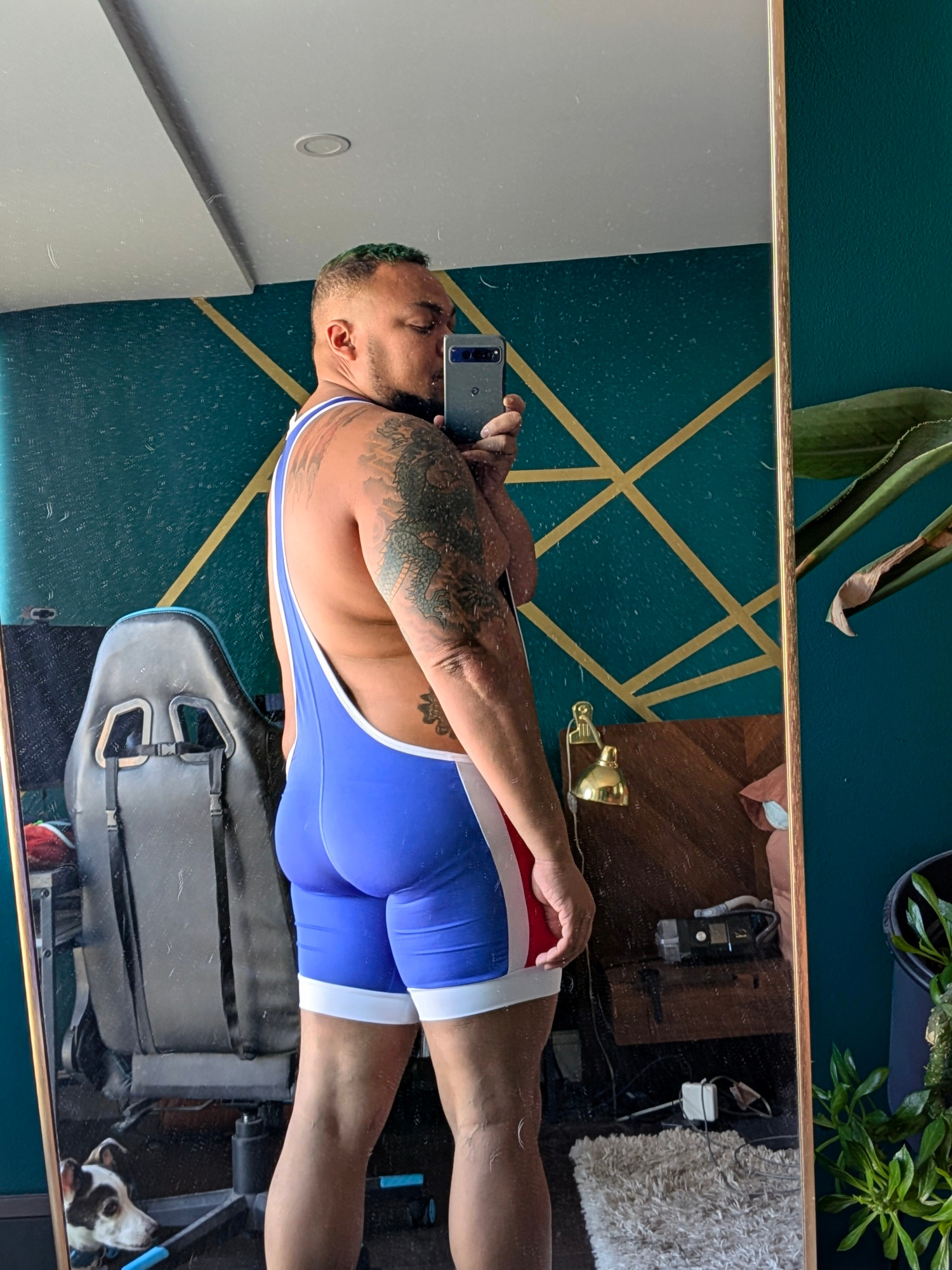 Mirror selfie of me in a blue singlet