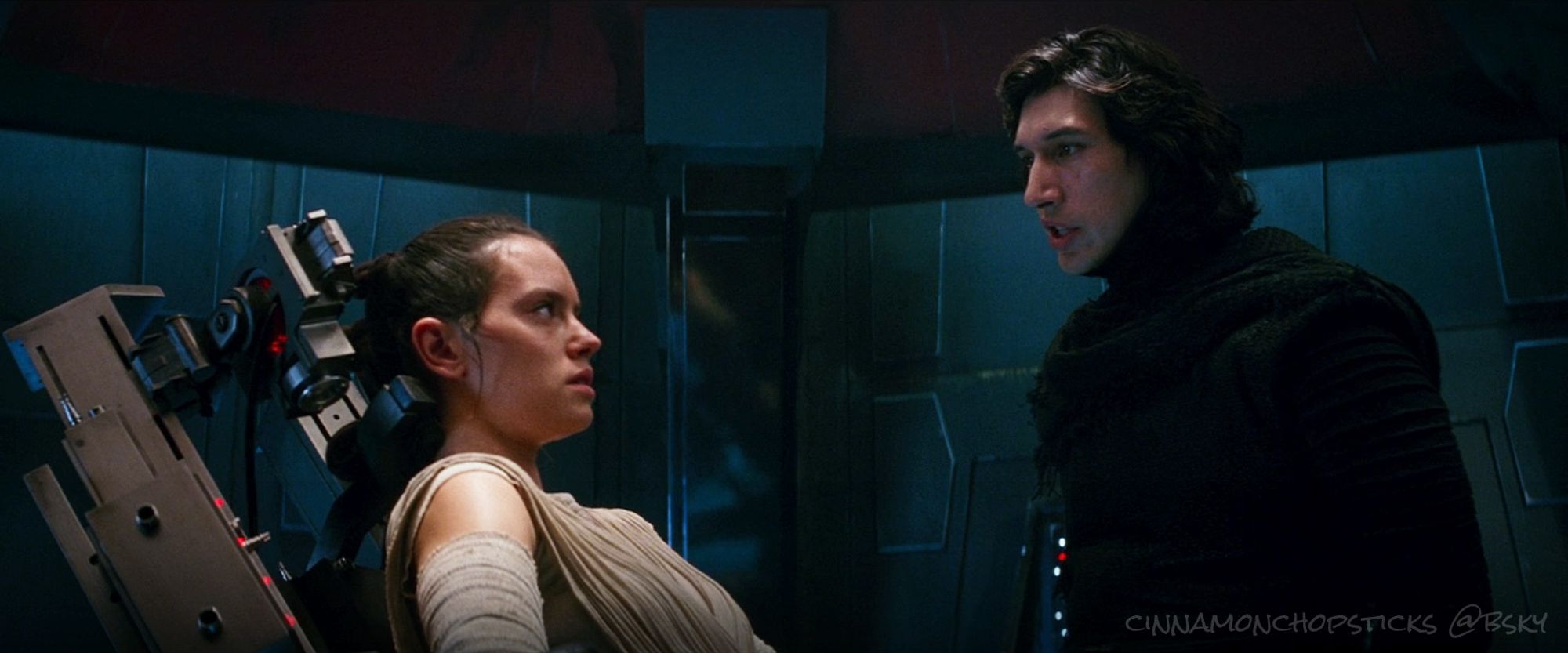 Their eyes challenge each other as Kylo interrogates Rey. Scene from The Force Awakens.