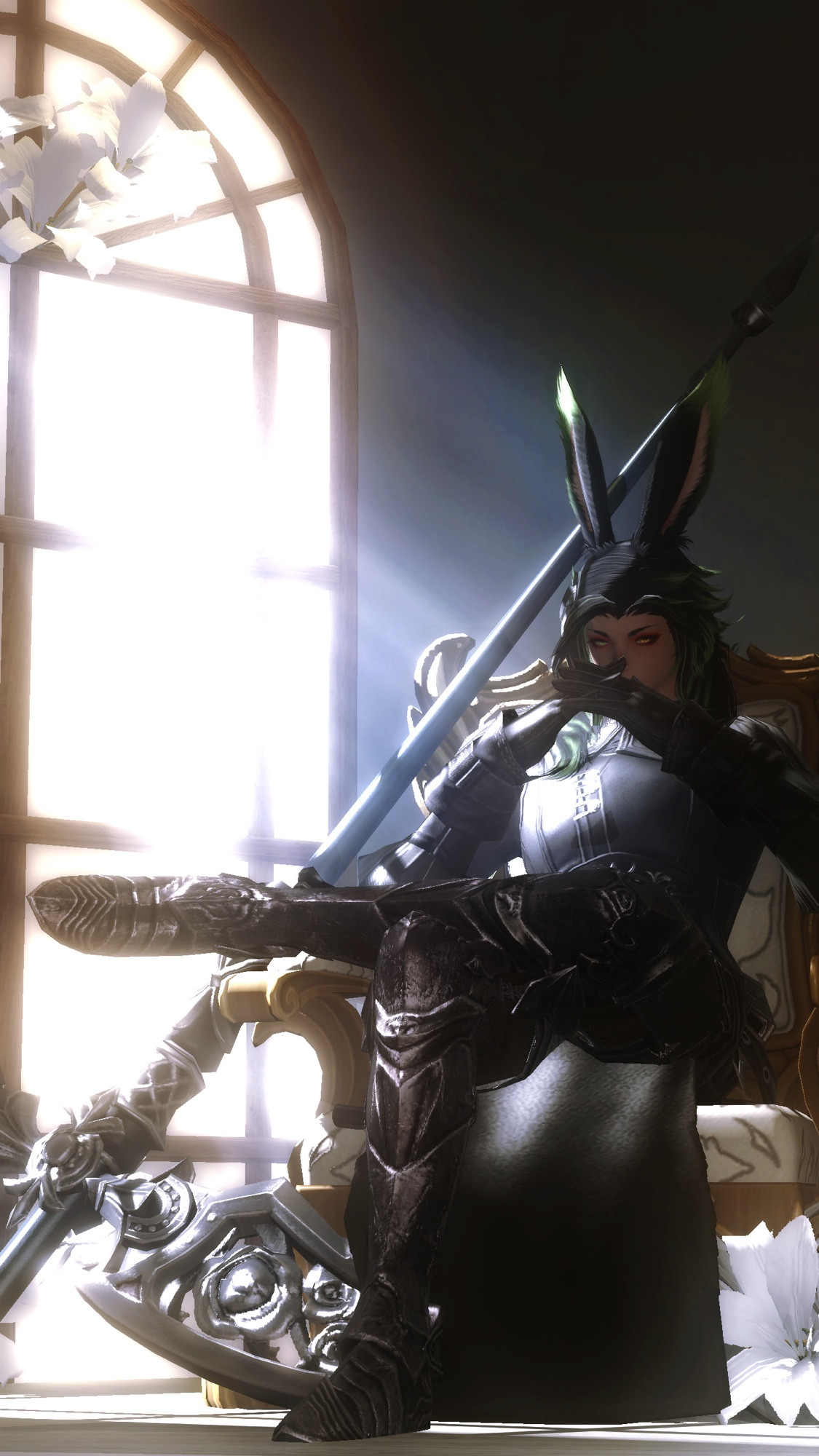 A half viera/half miqo’te sits on a chair, weapon by its side, where his mother once sat on. Window to his right shining light on him. 