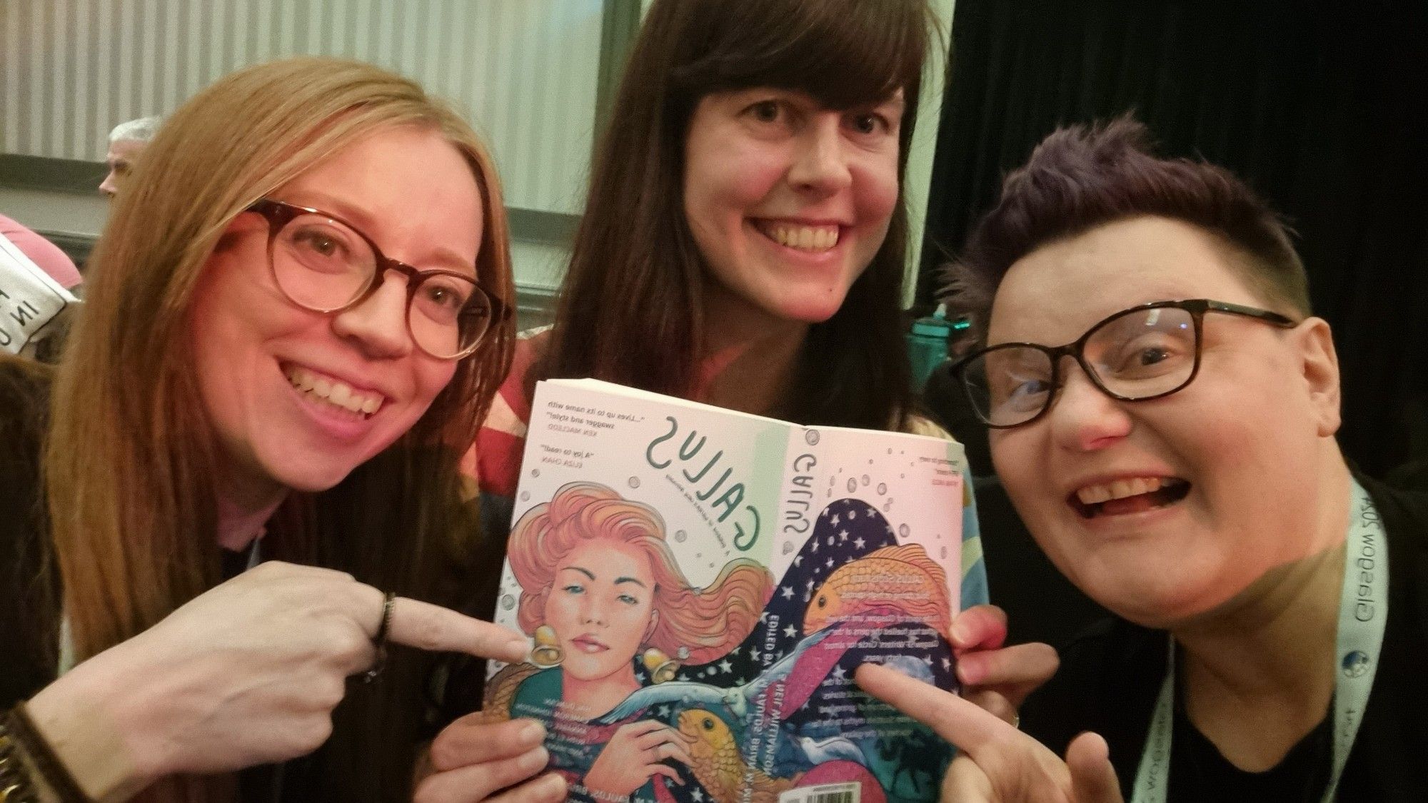 Authors T.H. Dray, Sophie C. Baumert and Ruth EJ Booth hold a copy of the Gallus book.