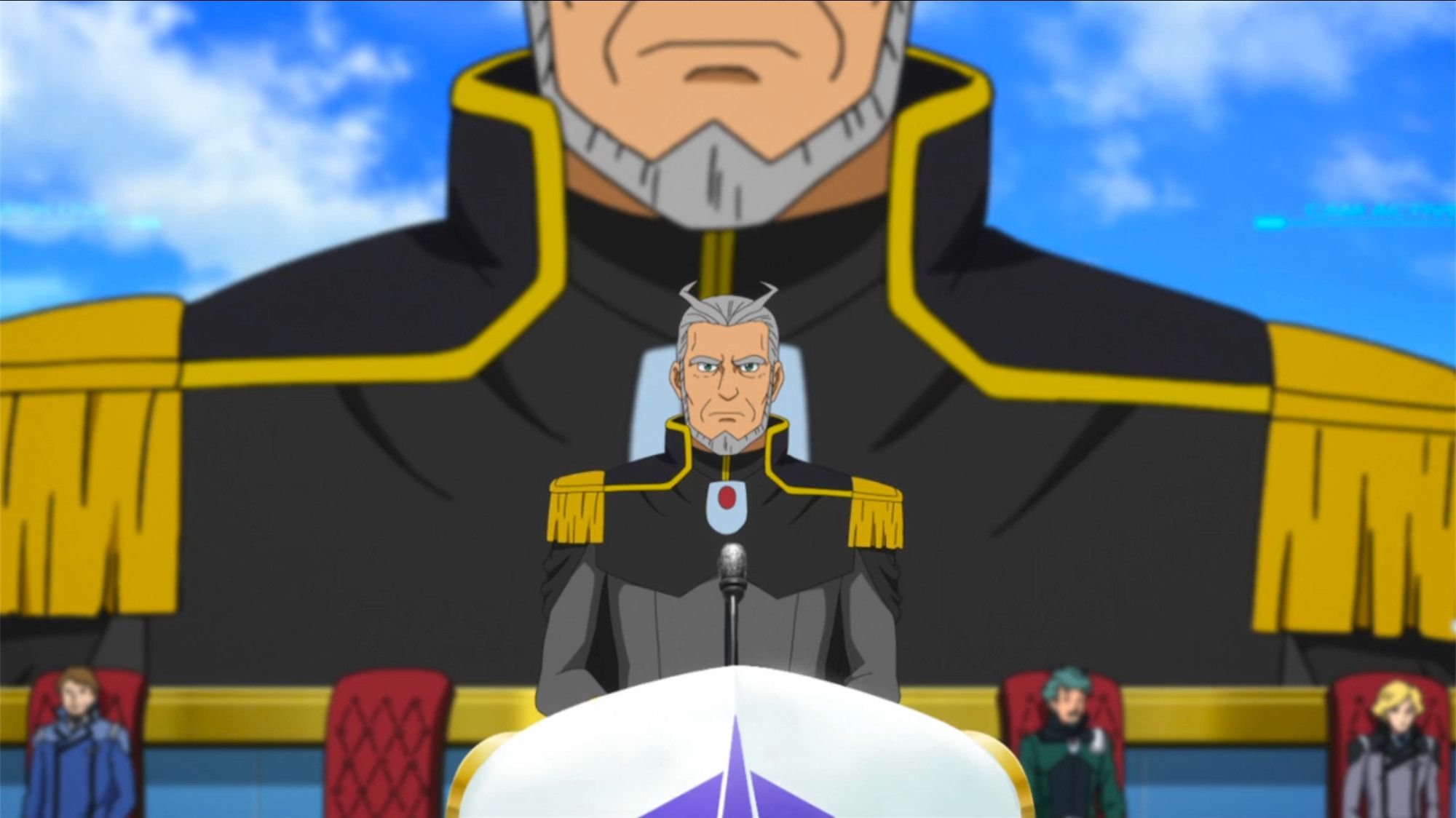 The Federation big wig guy has two hair spikes on the front of his head that look like a Gundam V fin